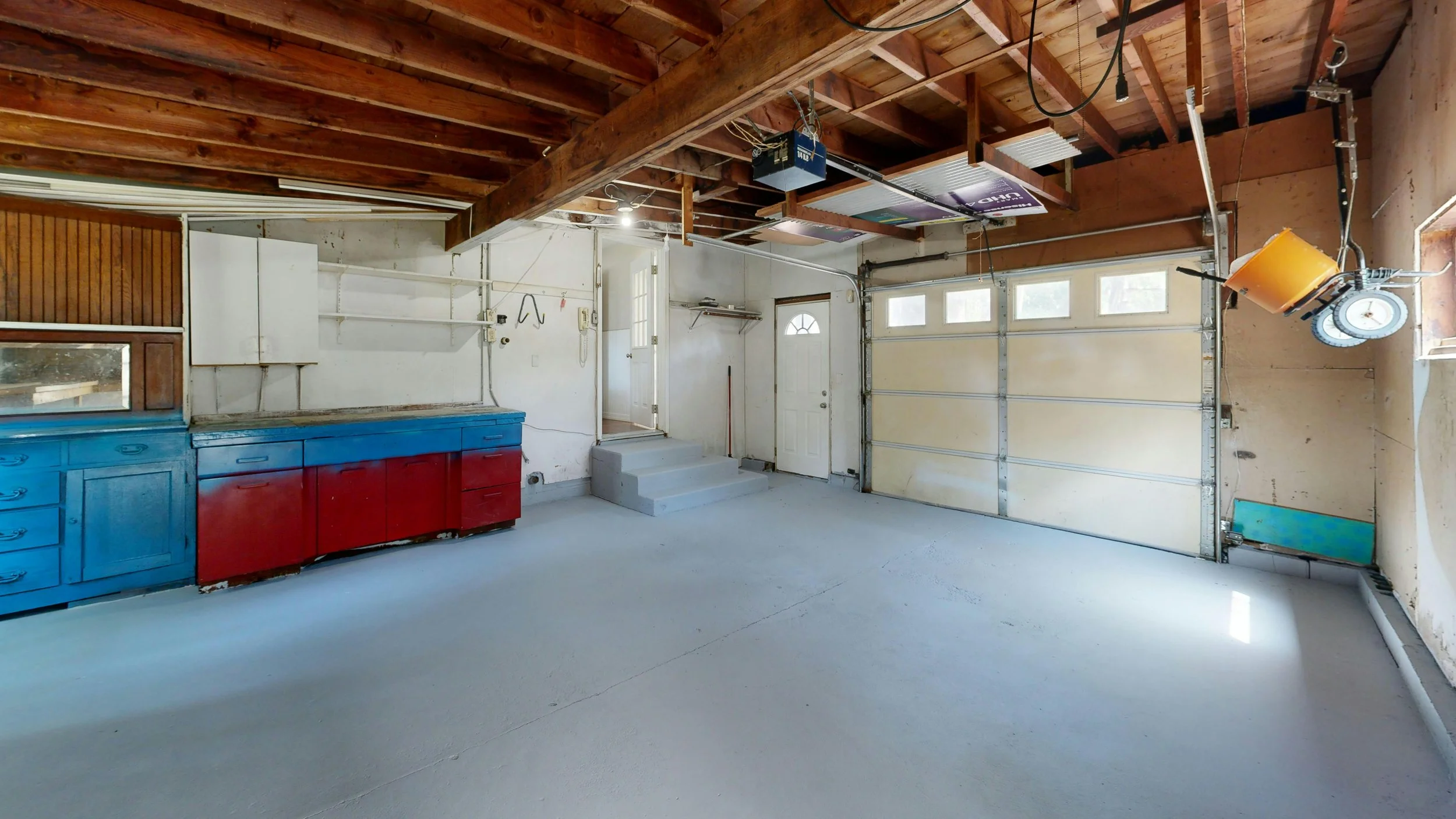 Freshly organized garage with open floor space, showing how busy homeowners can create calm and order with flexible virtual organizing support.