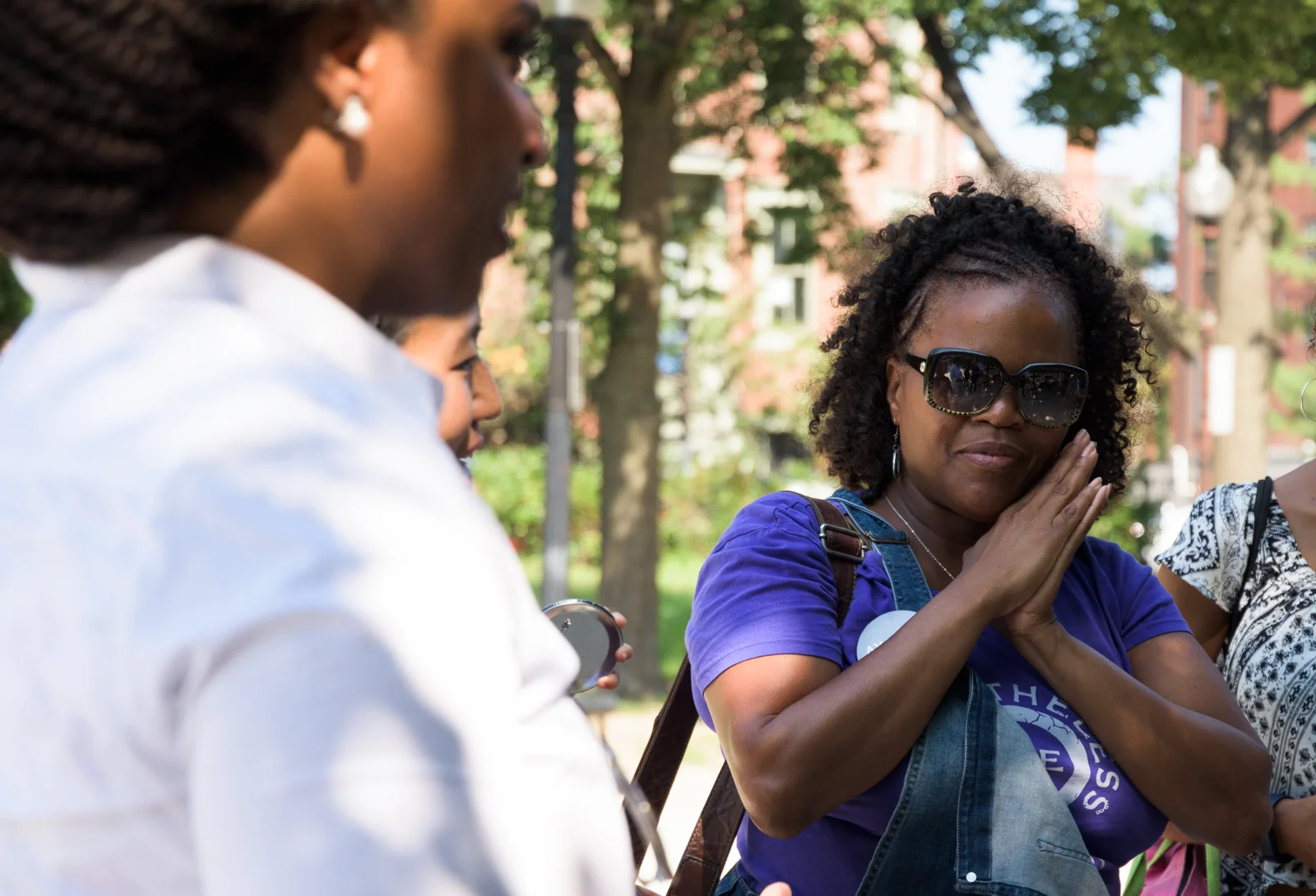  City Councilor Kim Janey of District 7 watches Pressley speak. Earlier, Janey had emphasized the importance of canvassing, and said, “This is where [change] really happens.” Following Pressley’s speech, Janey canvassed the neighborhood with other vo