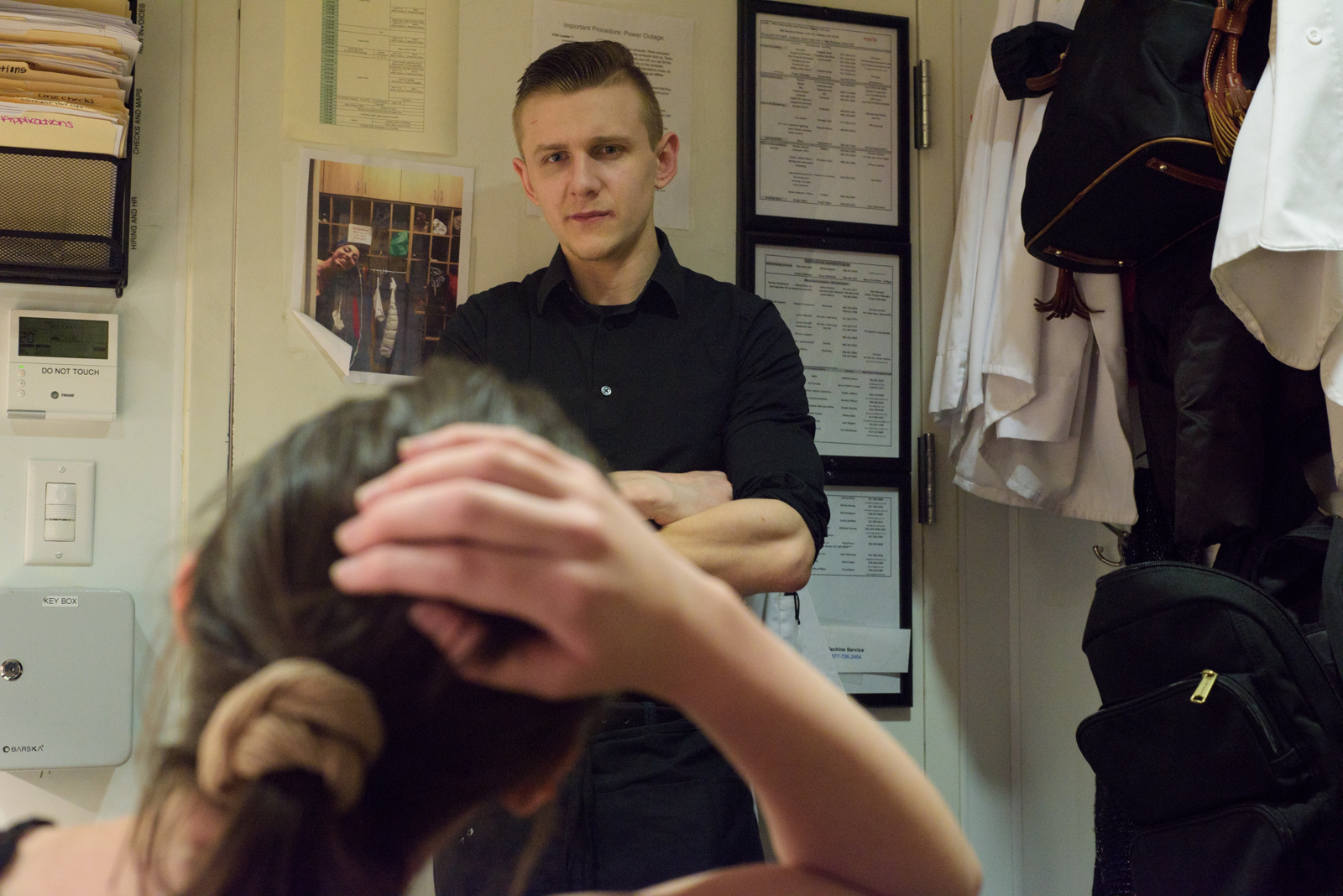 “I cried earlier about the way he was treated,” Jess said about her coworker, Mike Baruffaldi, who is pictured here describing how another server stole a table from him on Apr. 3, 2019. One of Jess’ responsibilities involves listening to employee co