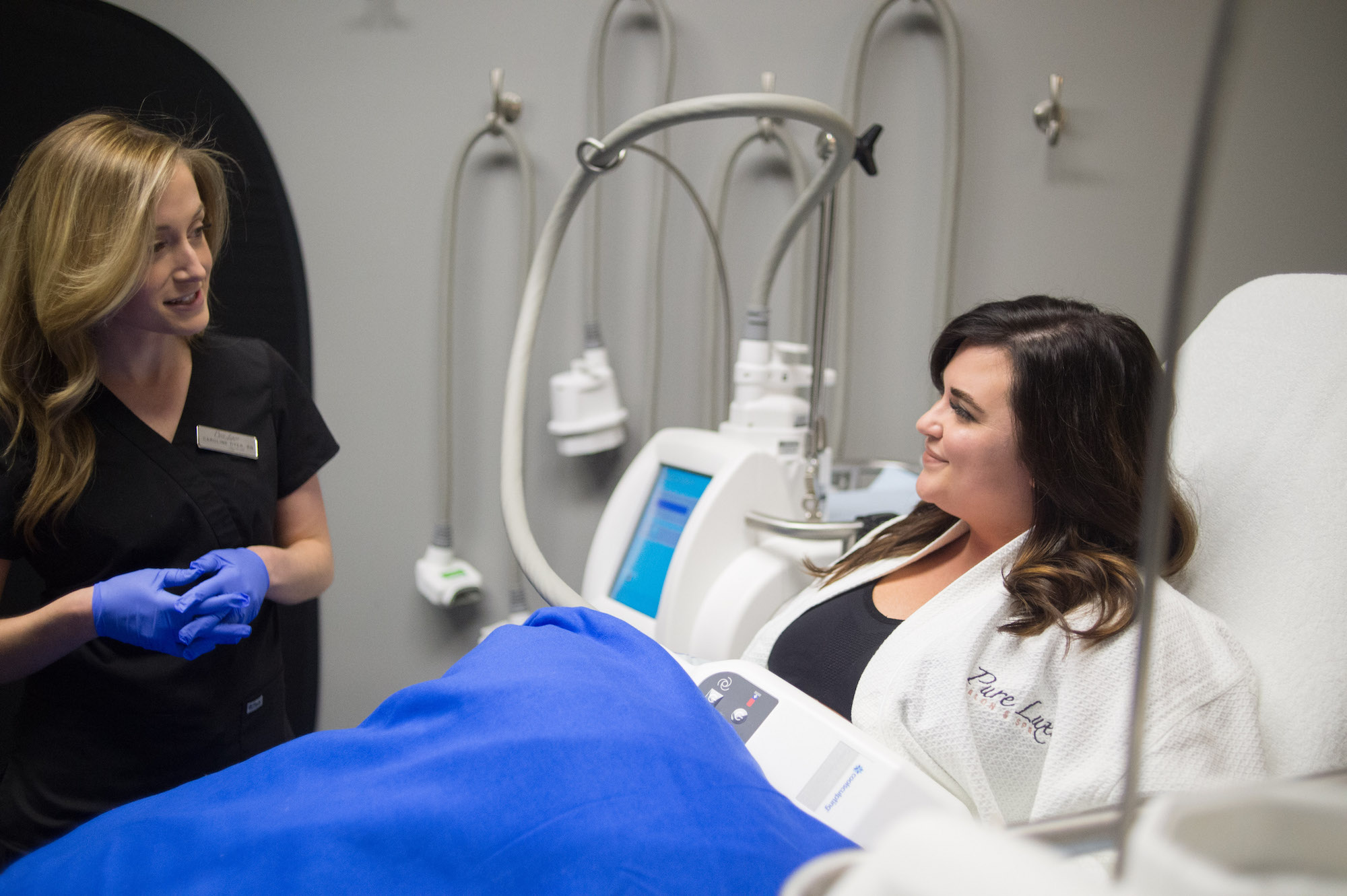 Patient receiving treatment at a Live CoolSculpting Demonstration.