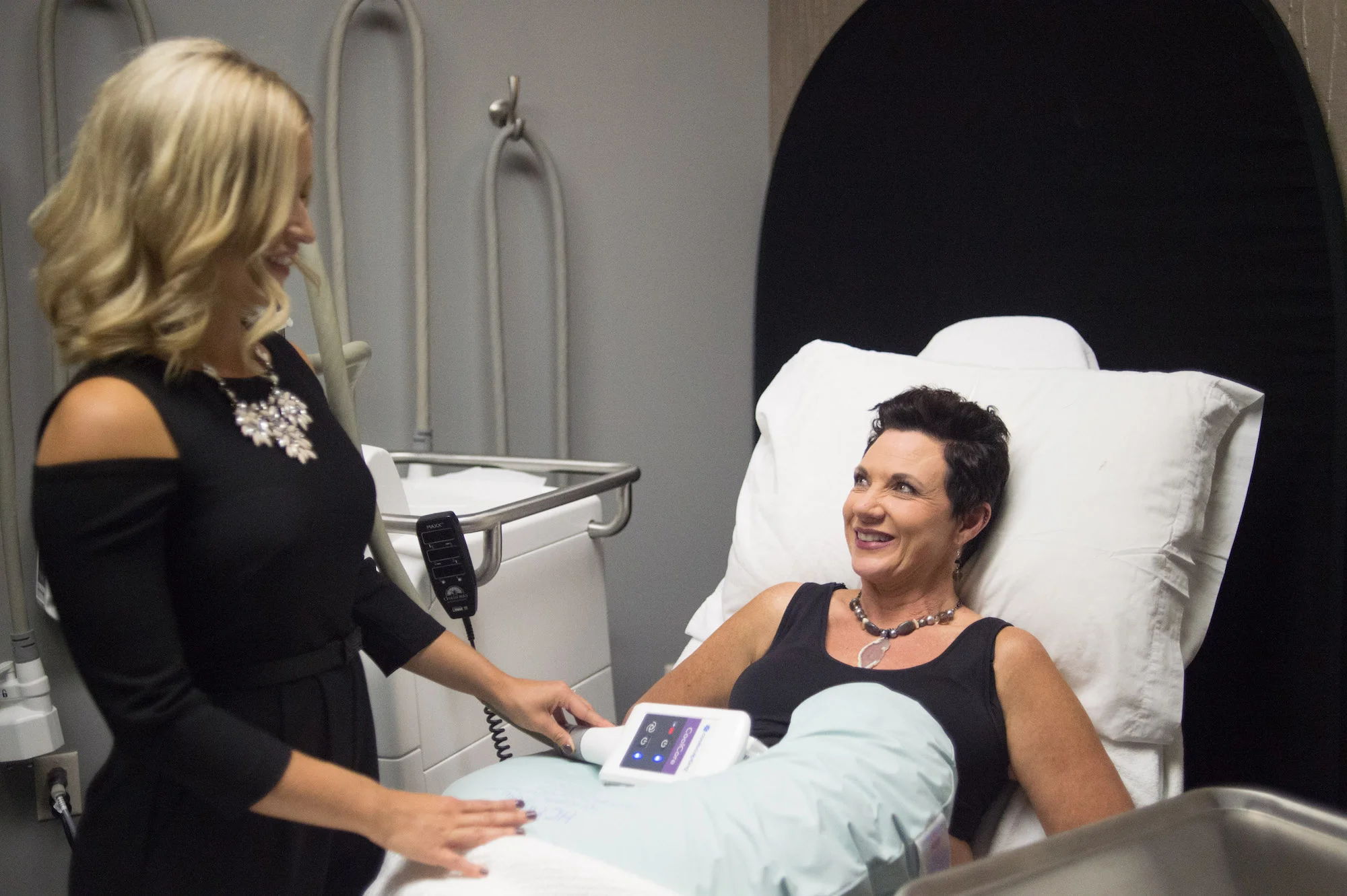 Patient receiving treatment at a Live CoolSculpting Demonstration.