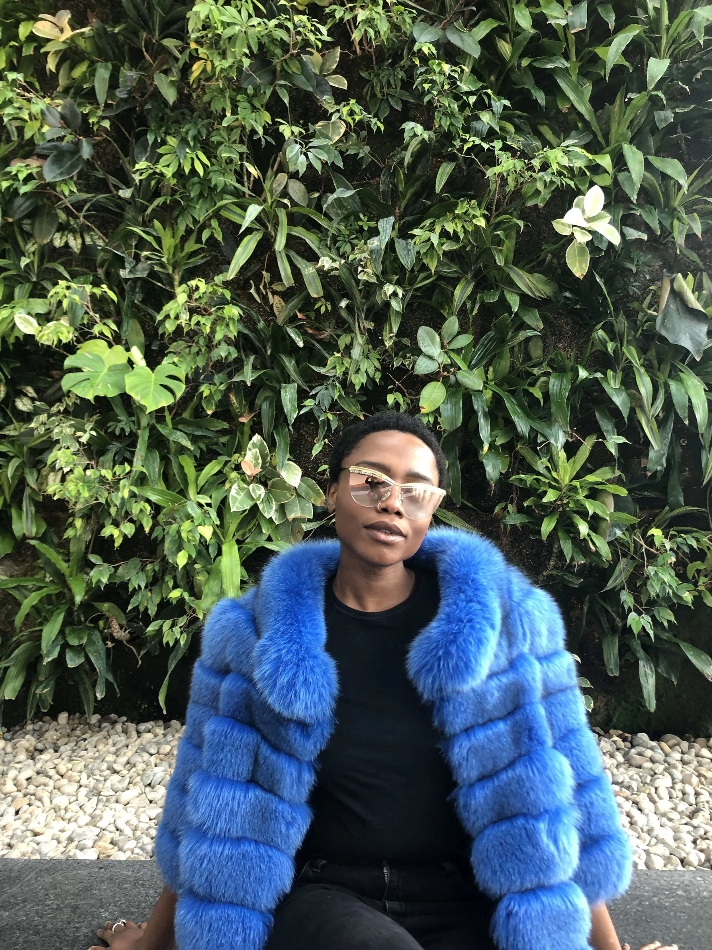 Model Chidera Sunny wearing Sunglasses from World Eyewear and wearing HSG Fur