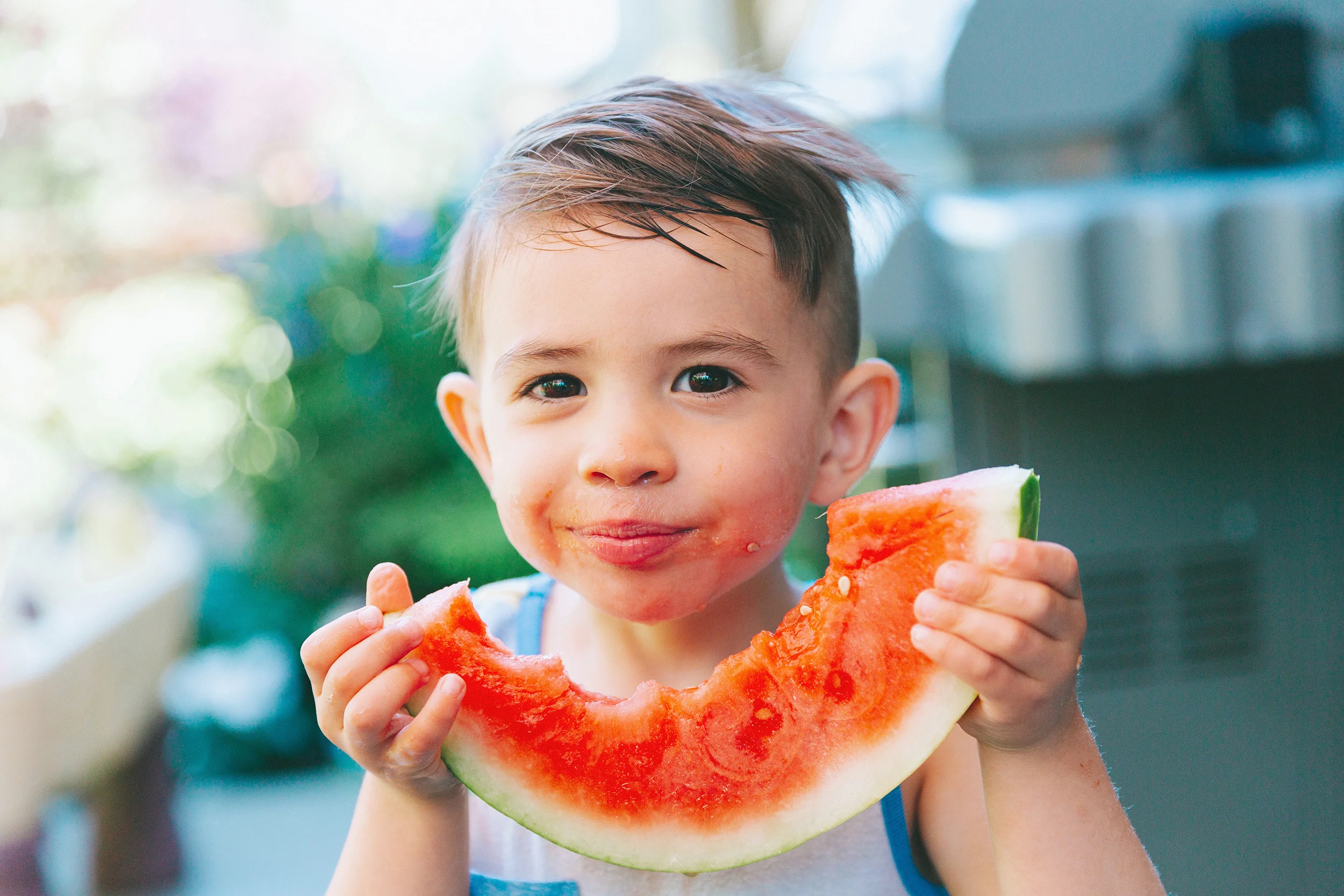 a-little-boy-eating-a-big-piece-of-watermelon_t20_7lN8o4_sm.jpg