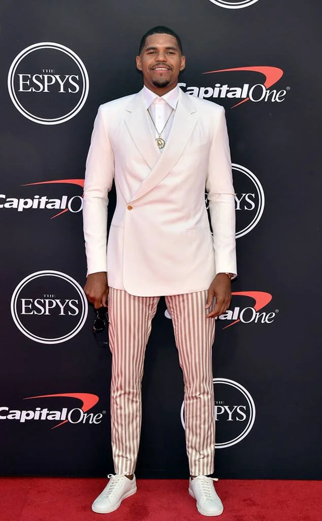 76ers Tobias Harris keeps it Hamptons Club-esque with off-white double breasted blazer and striped trousers by Damari Savile .