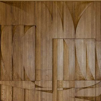 Close-up of a wooden geometric pattern engraved on a surface.