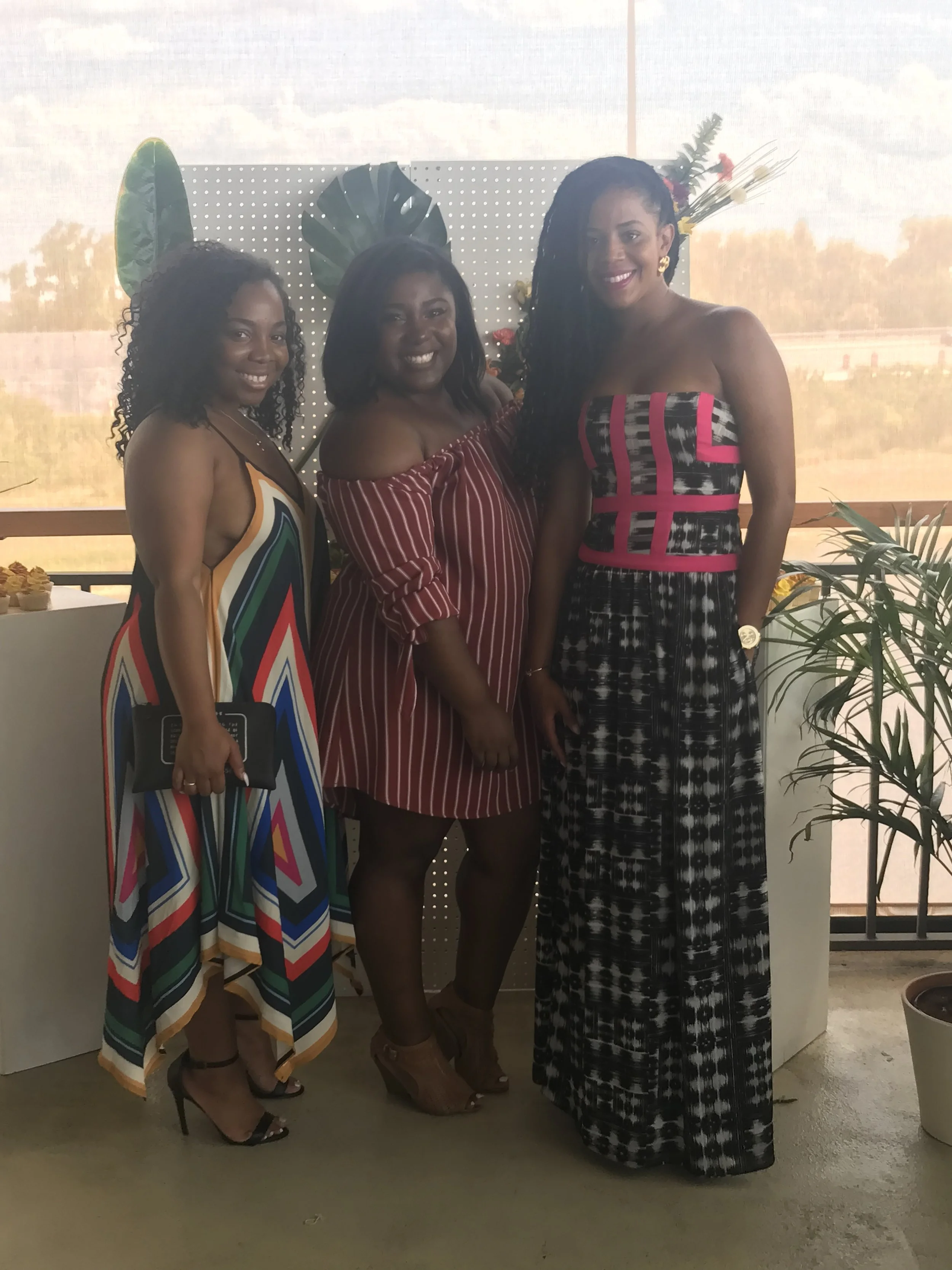 Alisia, myself, and Jackie! Flower wall decor: India of Modern Giggles Event Styling