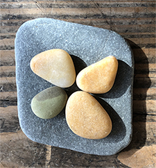 About the artist: Maggie Bodkin is a stone artist and beach walker who lives in Stow, MA.
