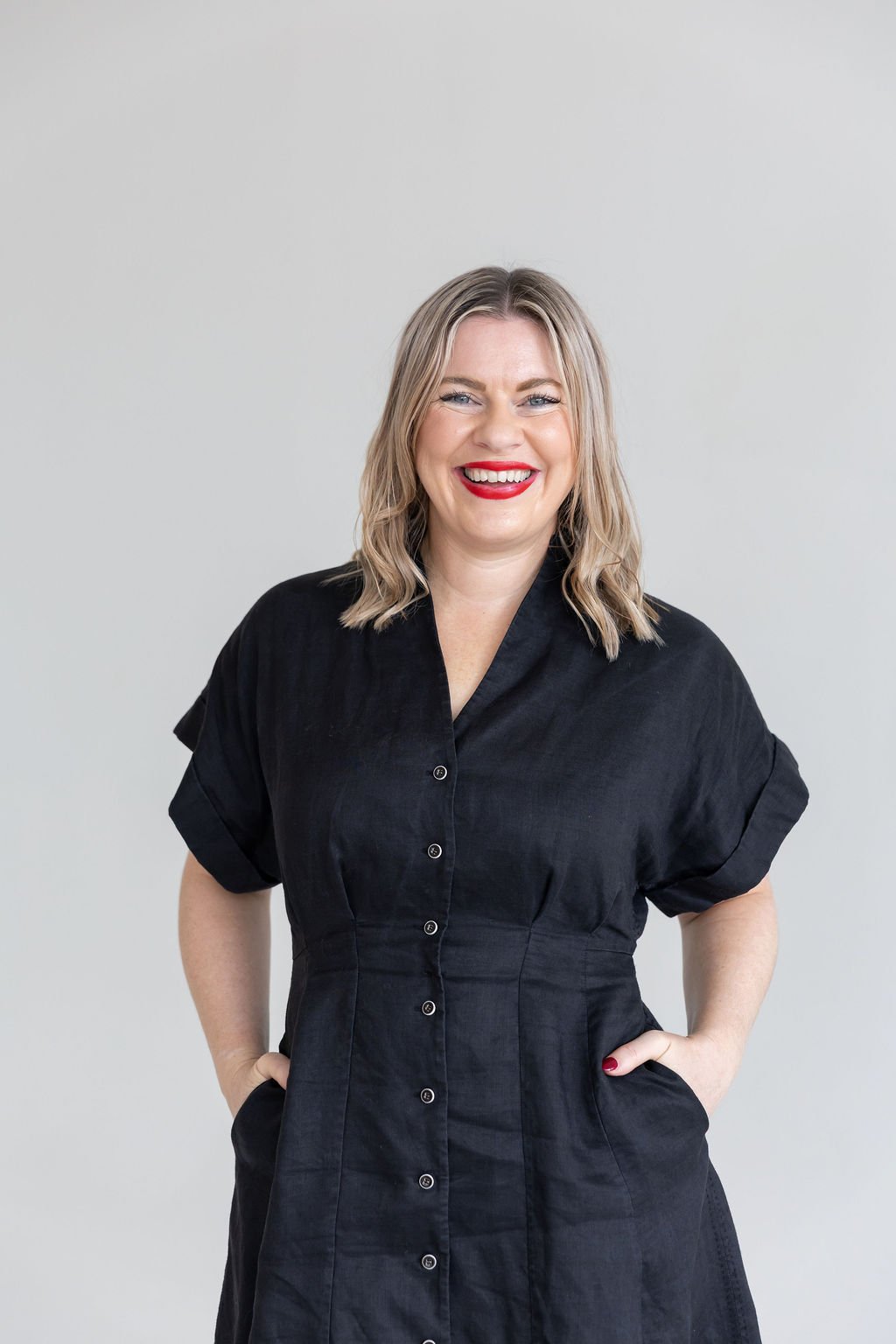 Portrait of Bec Sands, full length and smiling