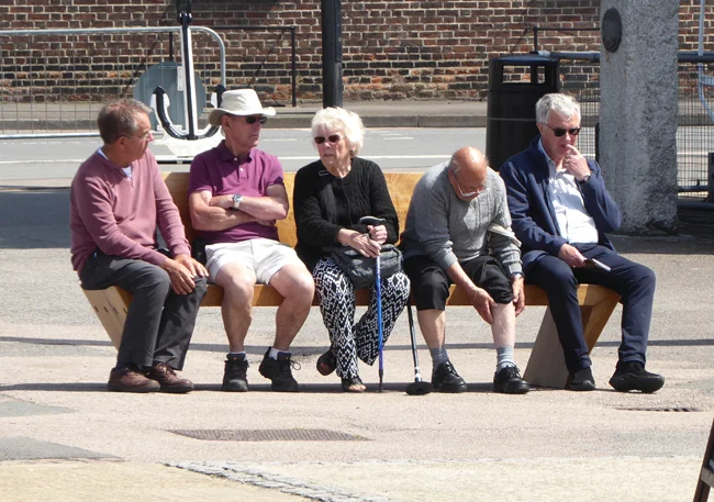 Relaxing in the sun, but the wind was surprisingly keen.