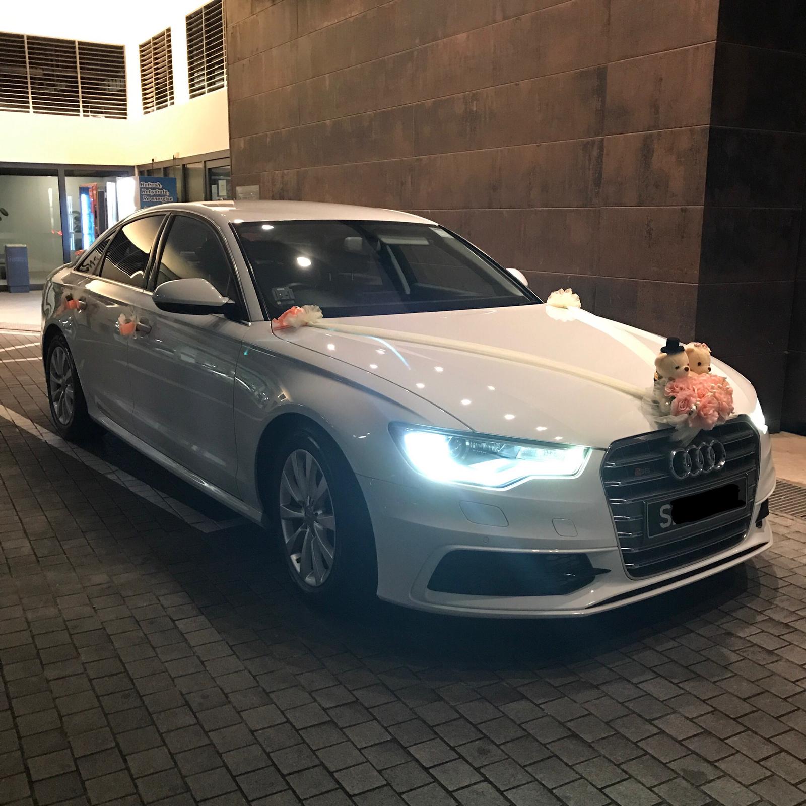 Audi A6 wedding car at night