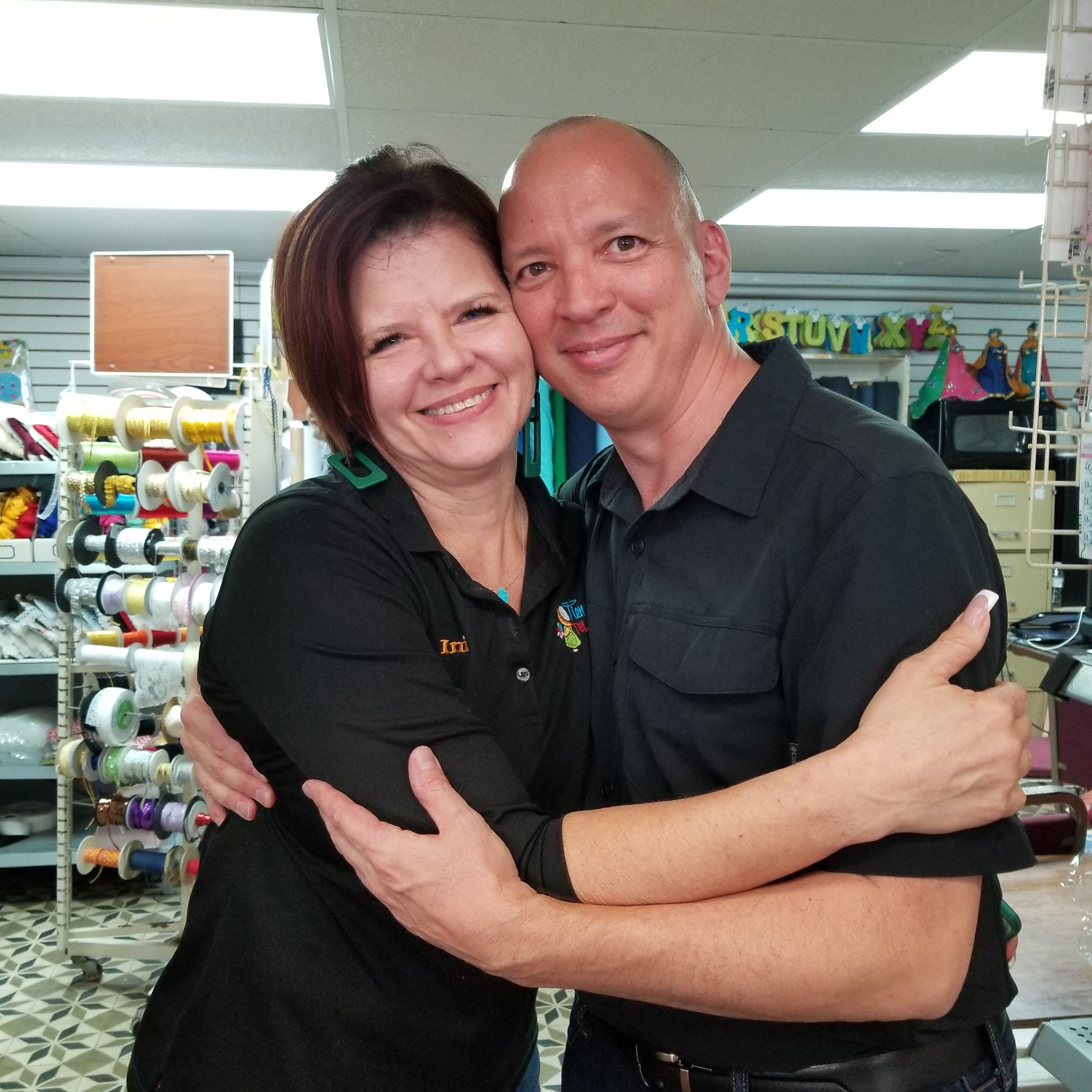 Smith, President of Unidos por Utuado and Ineabelle Medina, VP