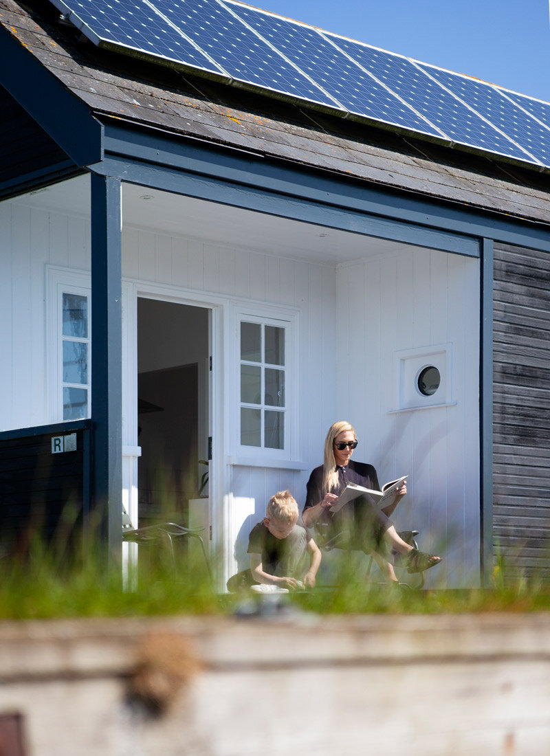 Water-Cabin-Family-through-grass-enki-norfolk.jpg