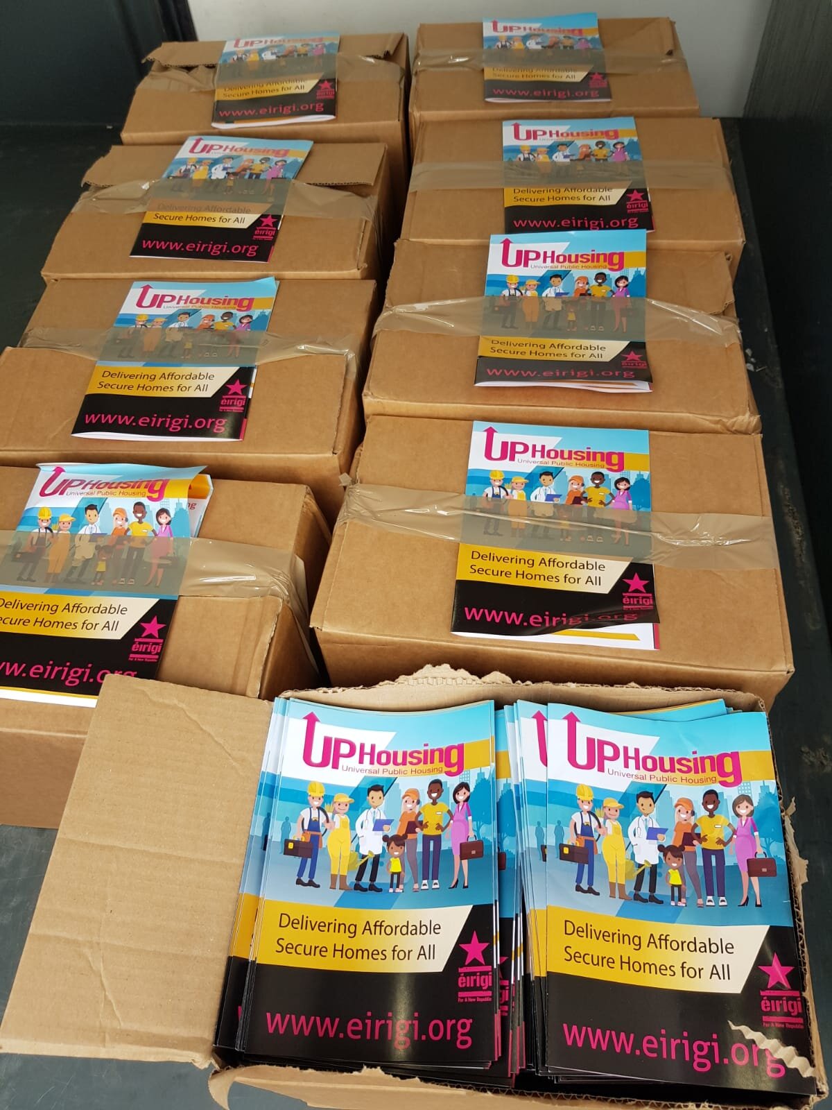 Boxes of the new six page UP Housing leaflet
