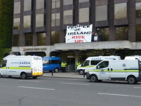 Éirígí activists on the porch of Anglo Irish Bank in March 2010. At that time the gombeens were still claiming the fundamentals of the economy were sound. Six months later they handed the state over to The Troika.