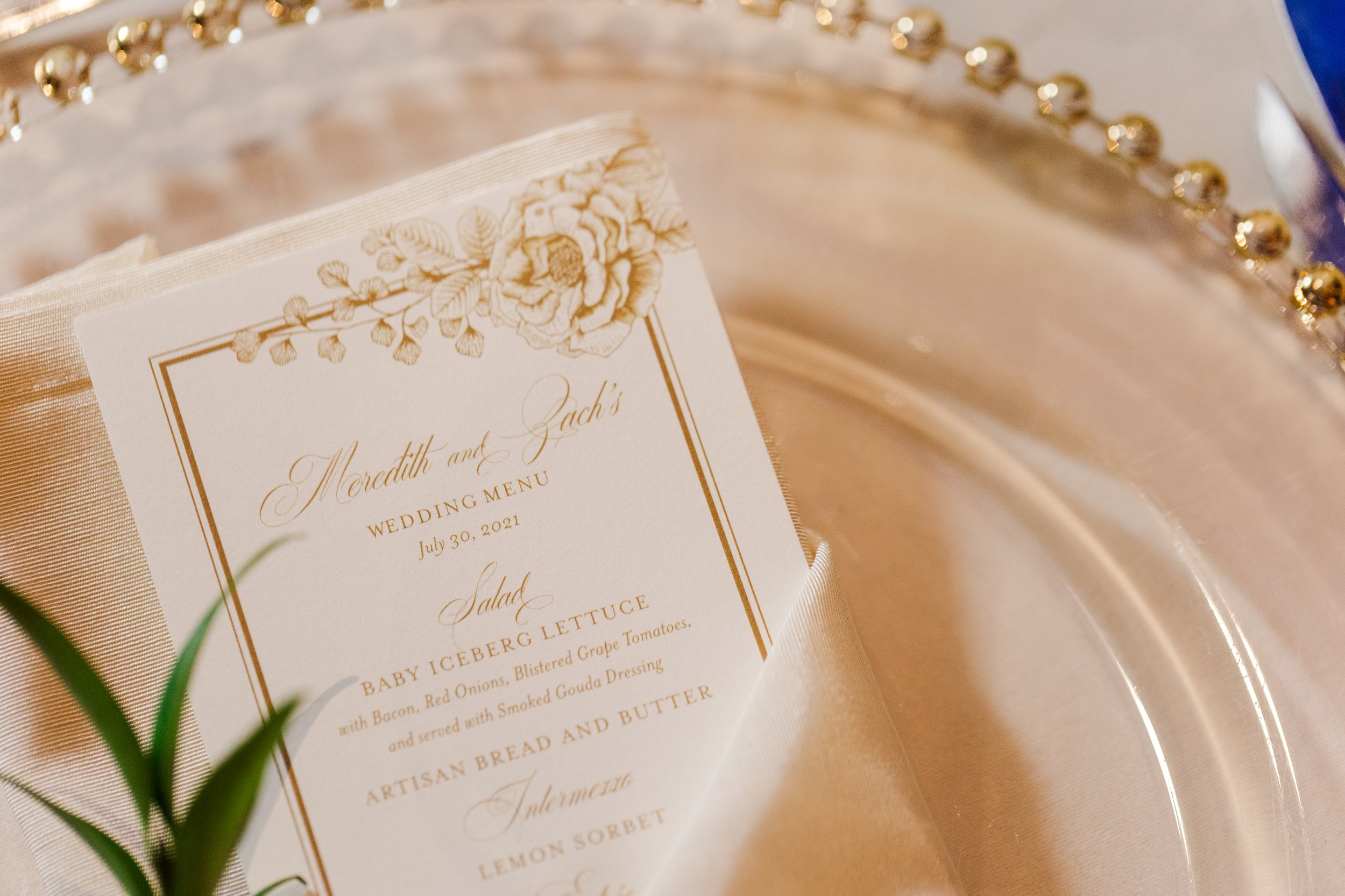 wedding dinner menu with gold floral detail