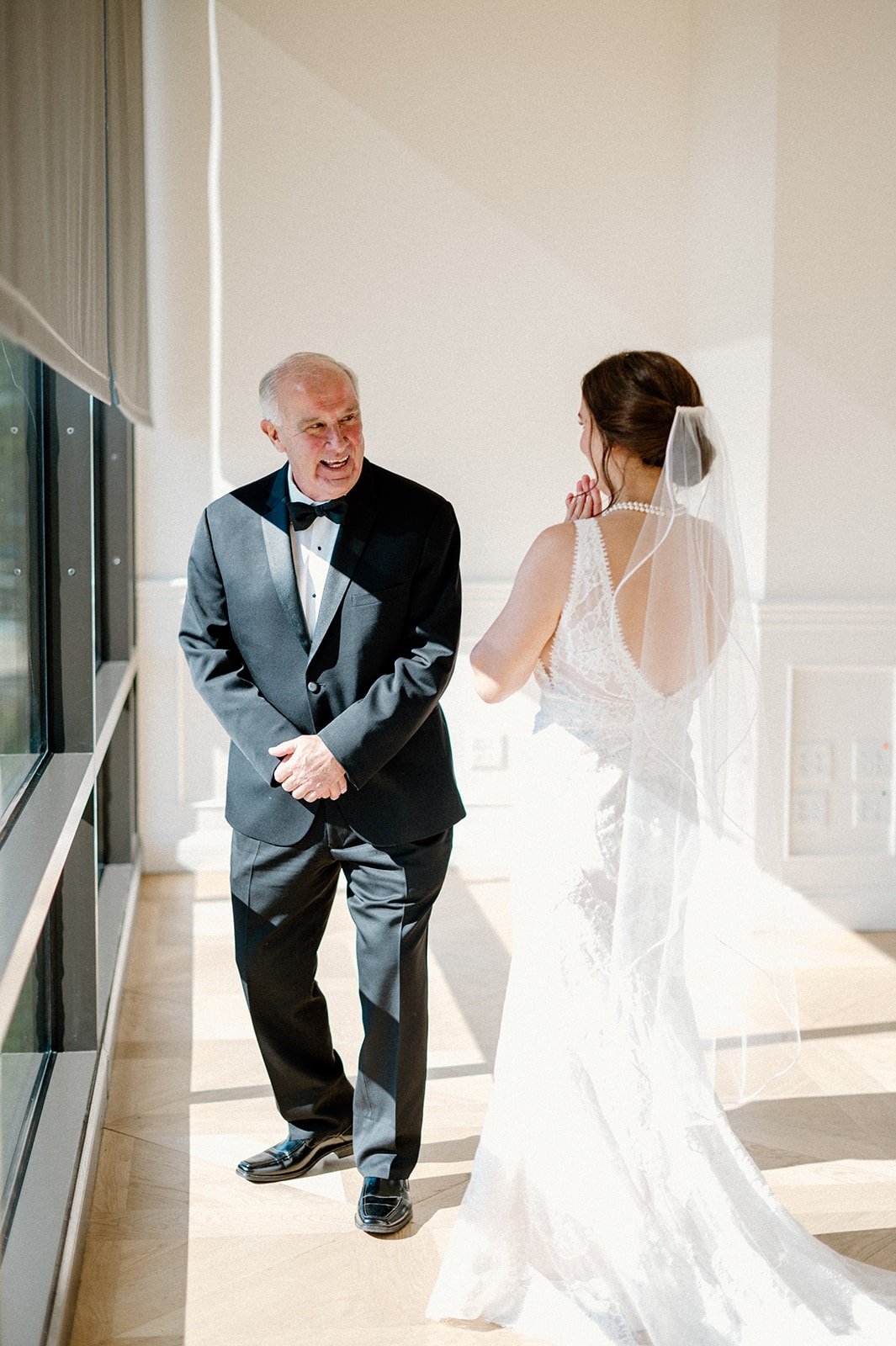 first look with dad on wedding day