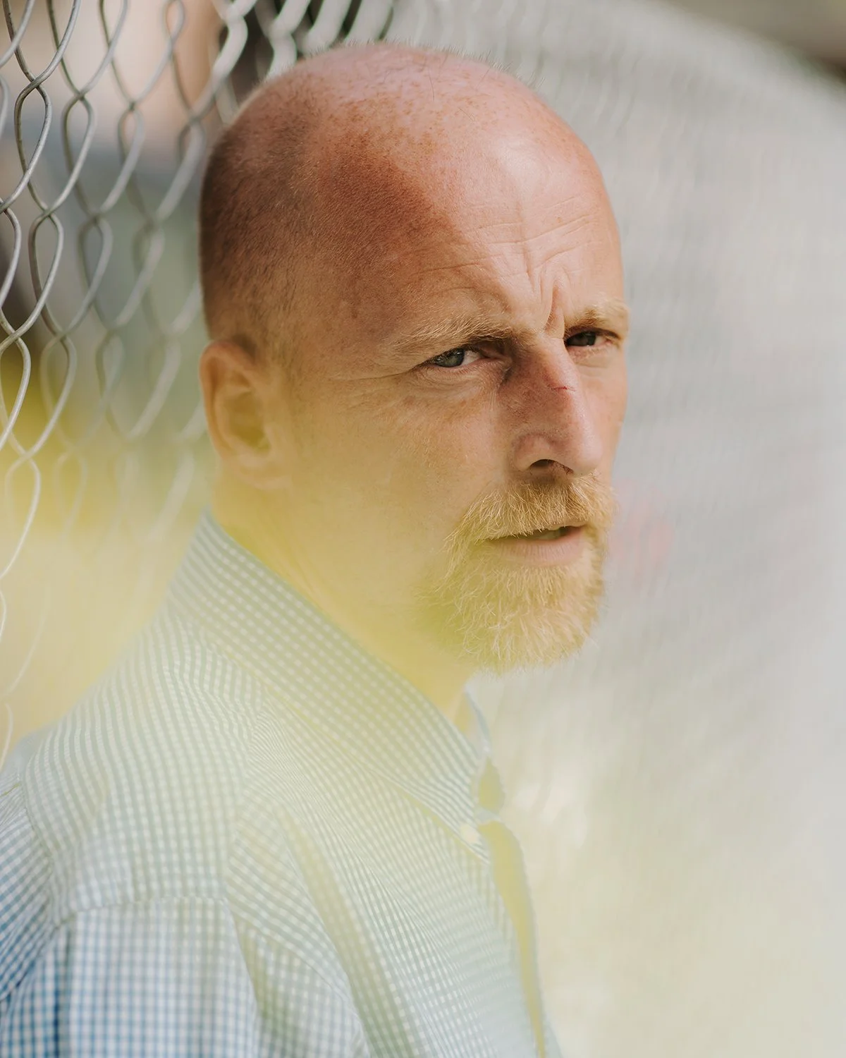 Owen Buzzard stands in his yard in Memphis, Tennessee where he claims a Memphis police office with the nickname taser face physically abused him