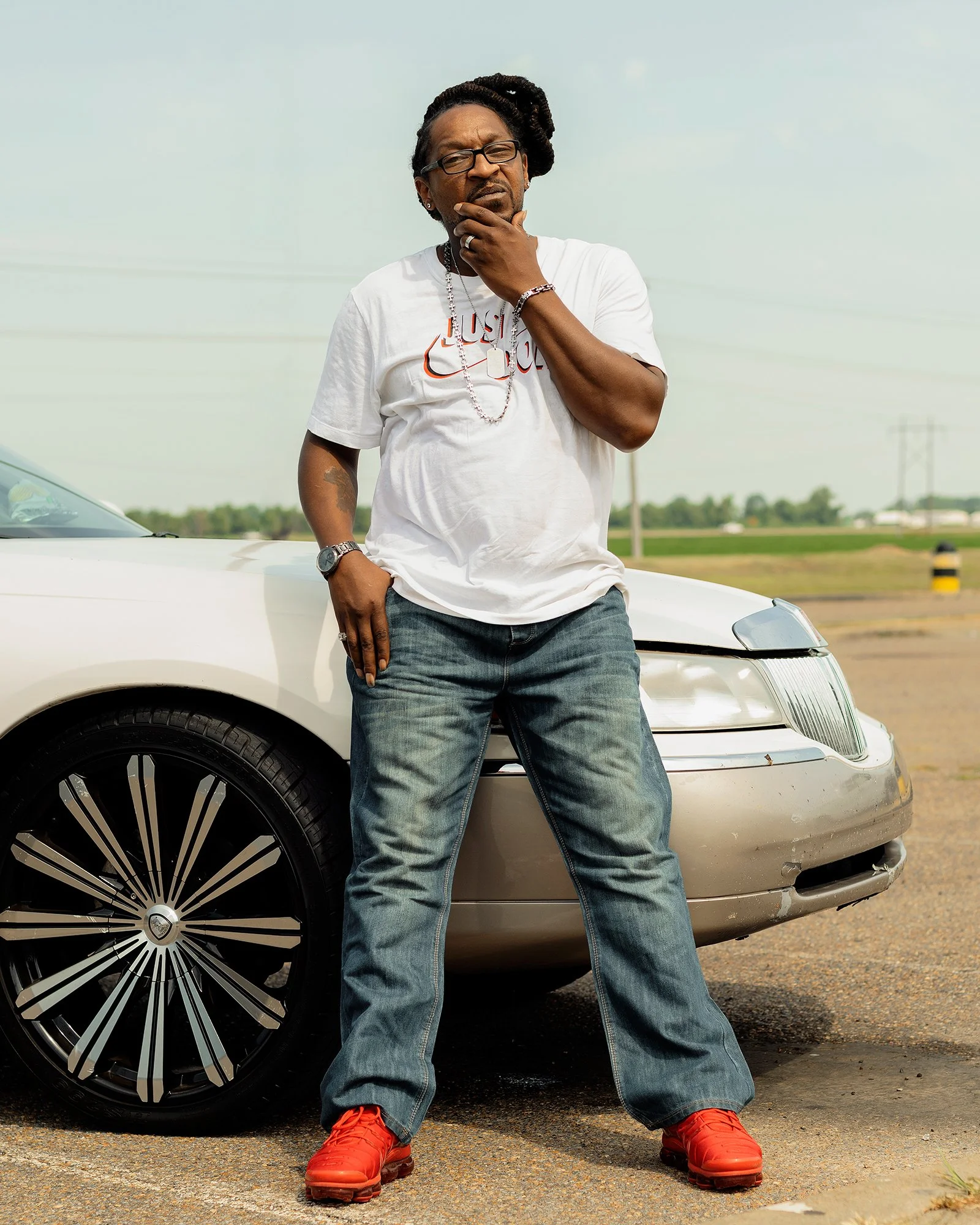Family Dollar employee stands in the parking lot of a Family Dollar distribution center in West Memphis, Arkansas