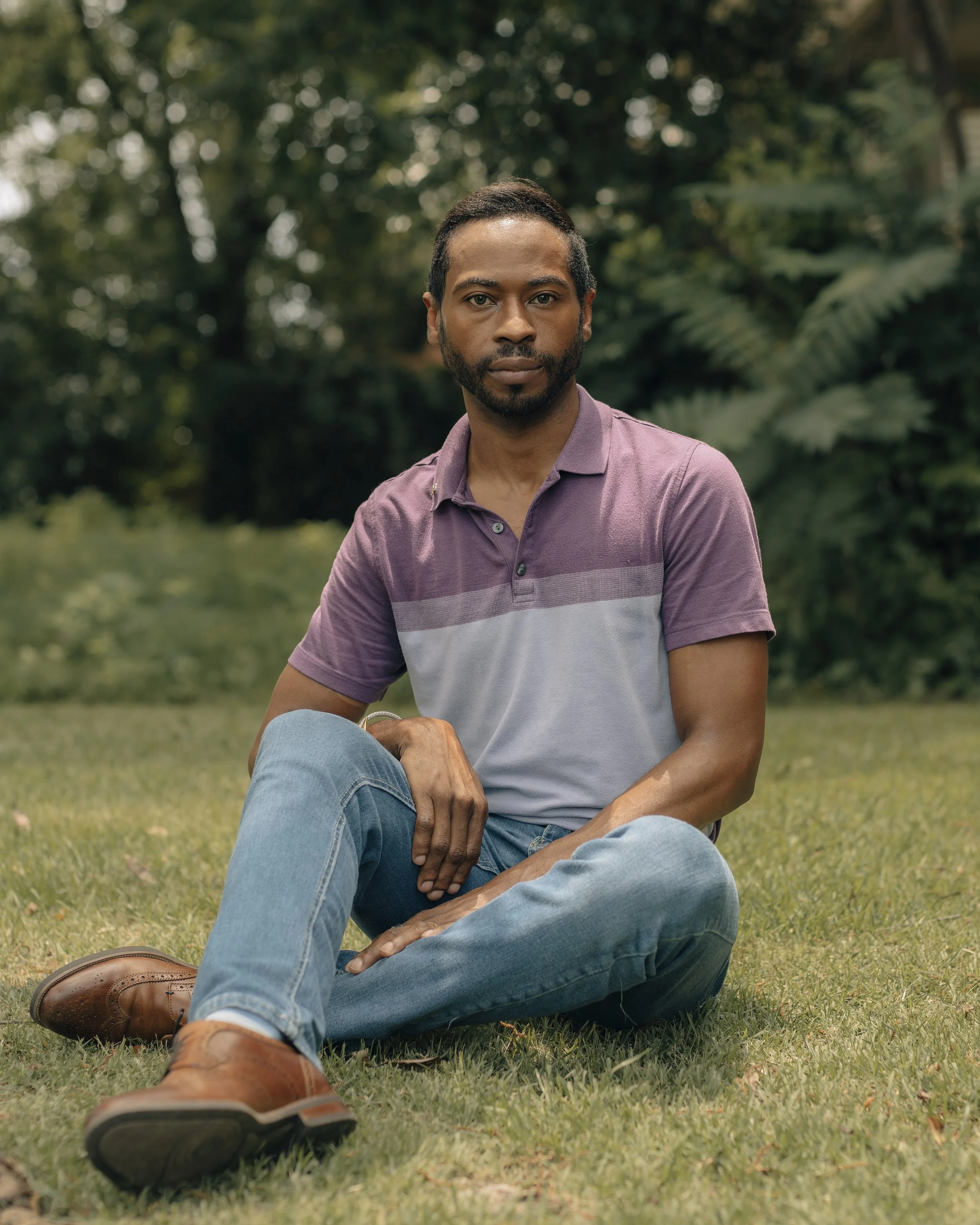 A man sits in his front yard after being evicted from his apartment in Memphis, Tennessee