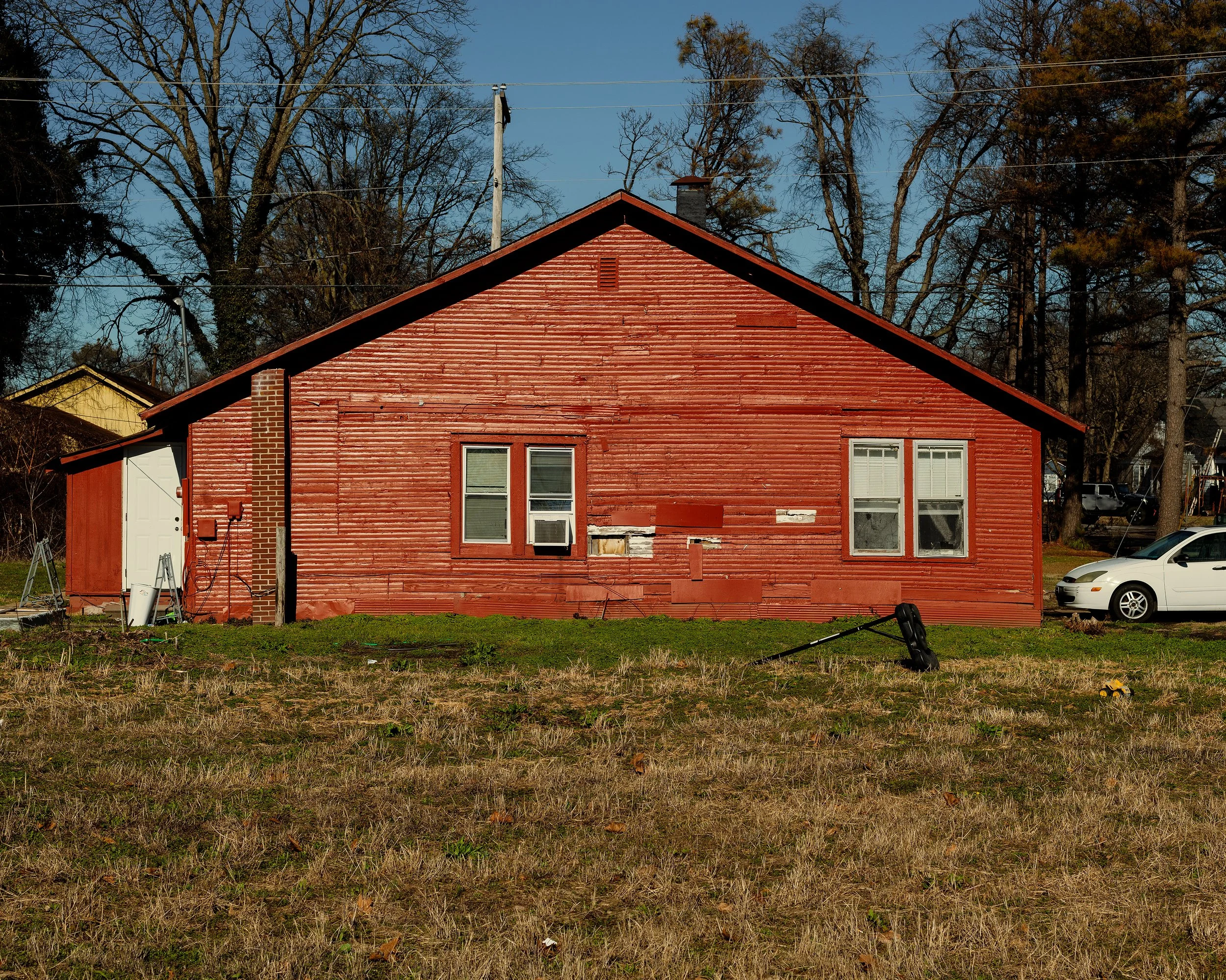 A red house in Earle, Arkansas photographed for The New York Times