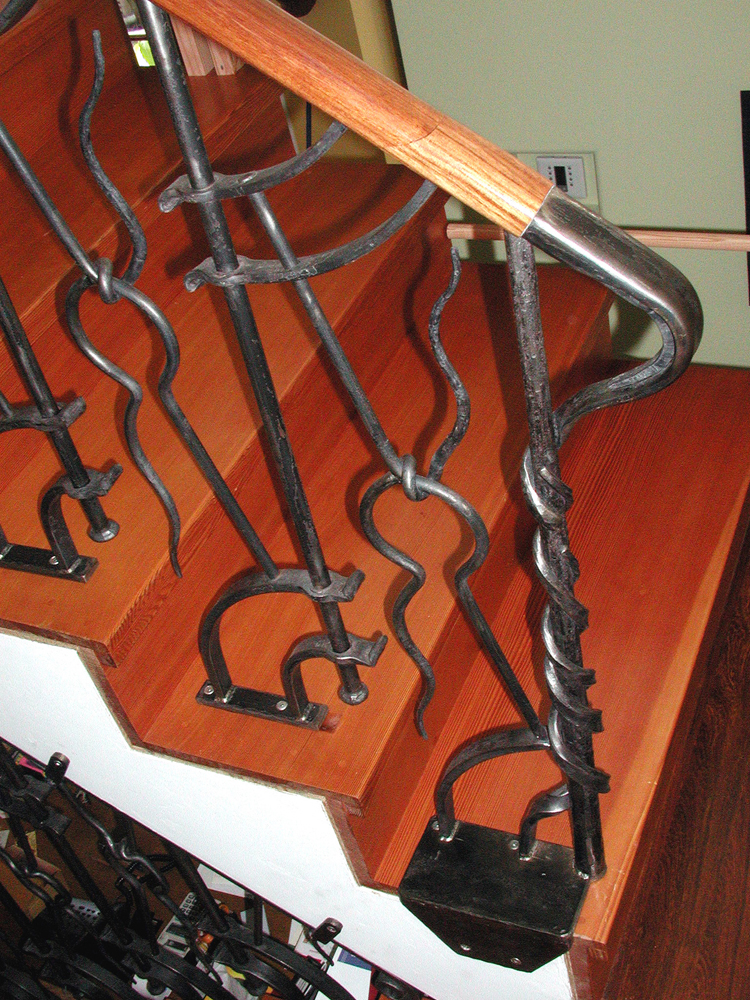 Wrought Iron Railing with Wood Handrail