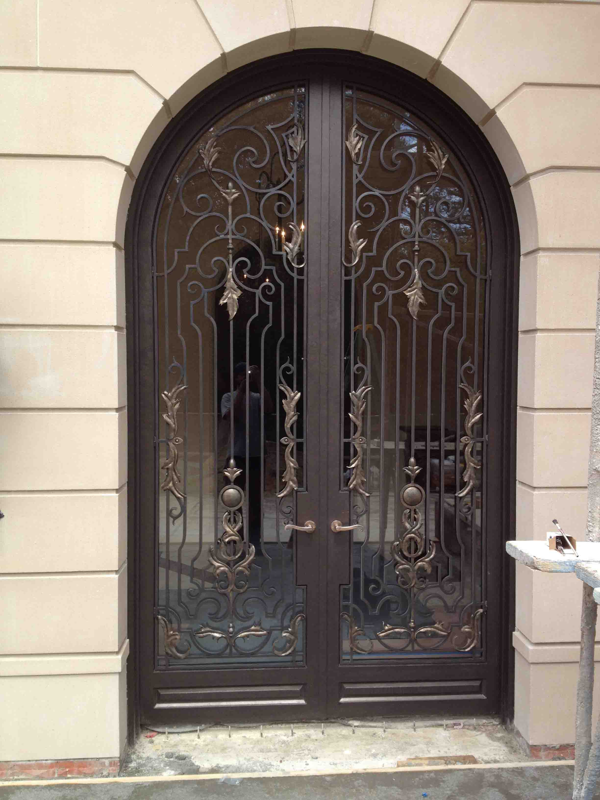 Hand Forged Wrought Iron Doors with Steel Scrolls and Bronze Handles