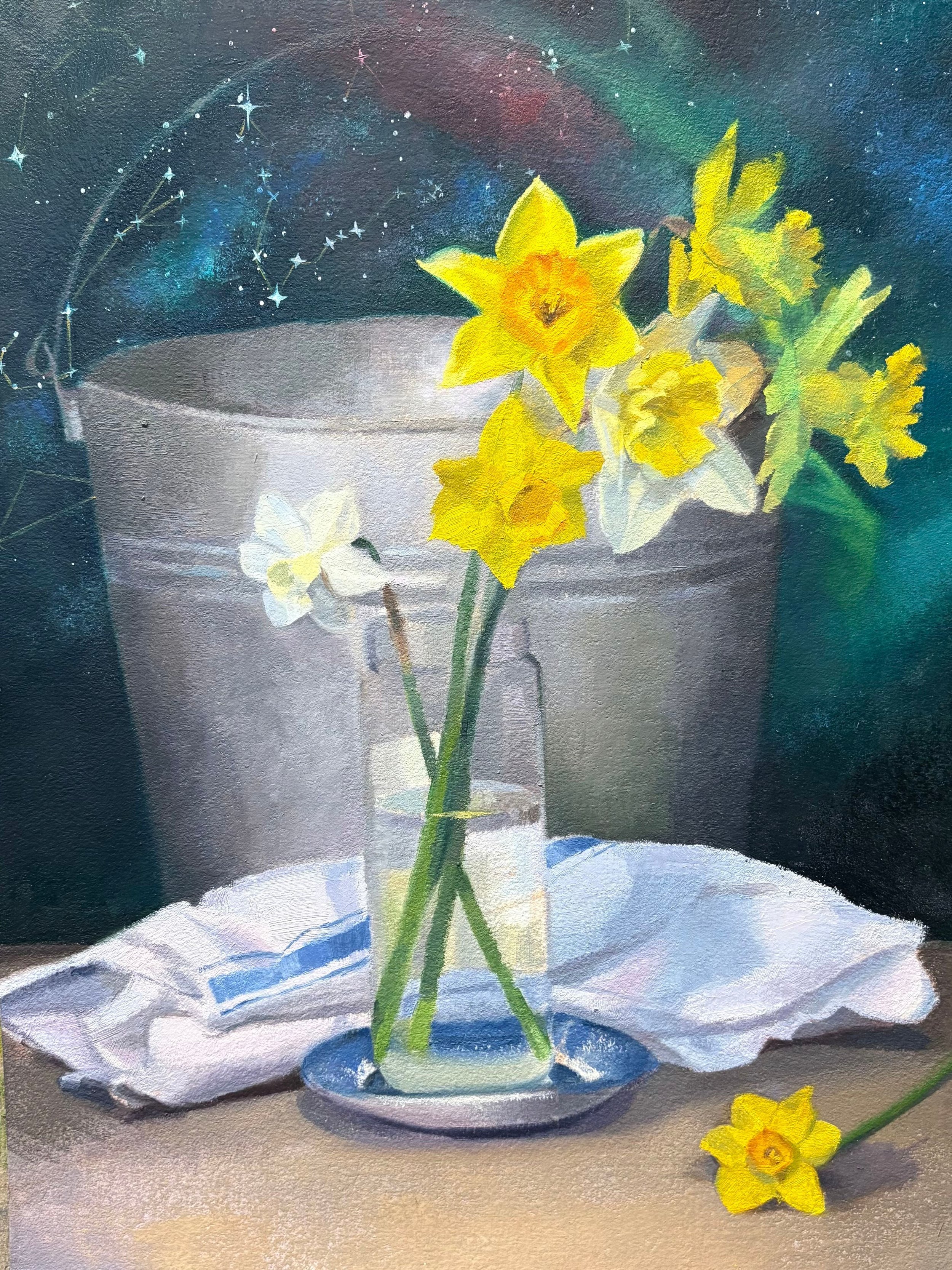 Painting of yellow daffodils in a glass jar on a table, with a white cloth beneath and a metal bucket in the background, set against a starry night sky.