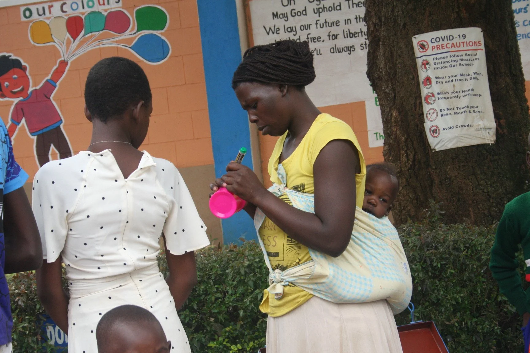 A parent lebeling her child's properties.JPG
