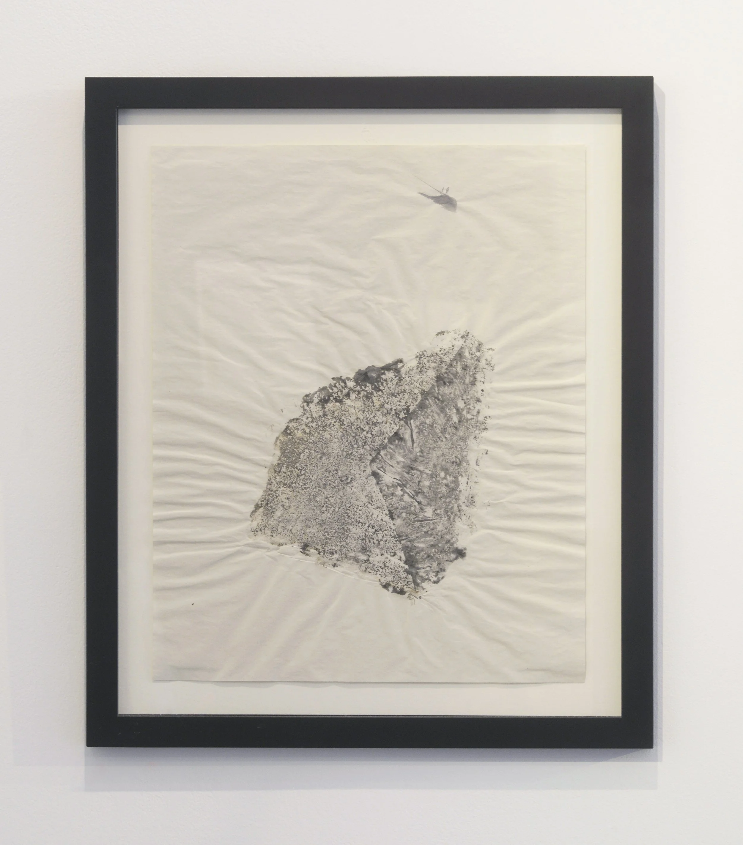 Shore Stones, 2021, ink imprint of a shore stone on newsprint. A Remix of Damage, Strata Collective, Reid Gallery, The Glasgow School of Art, 2022. © McAteer Photograph