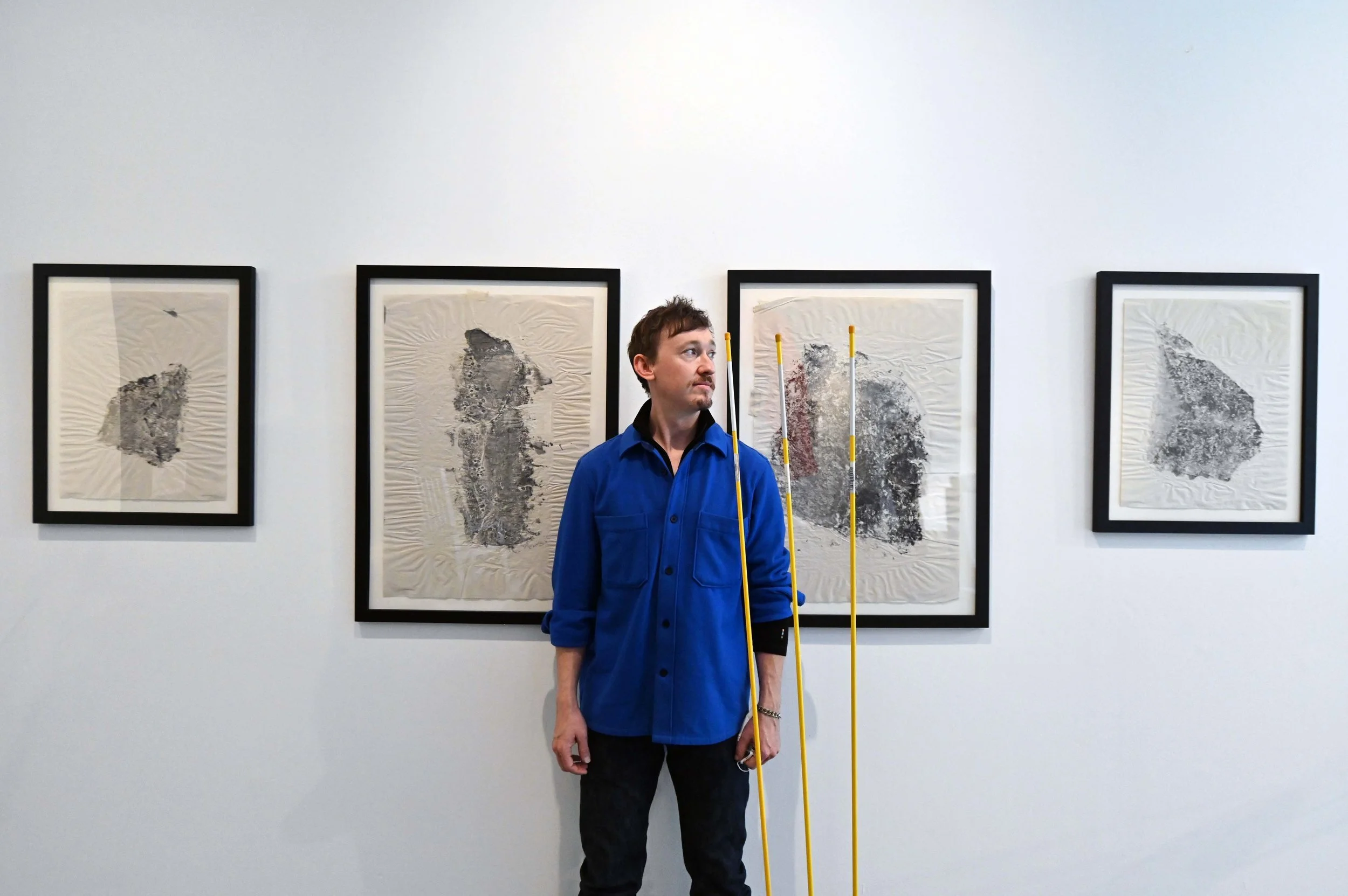 Shore Stones, 2021, installation view, ink on newsprint and stone. A Remix of Damage, Strata Collective, Reid Gallery, The Glasgow School of Art, 2022.