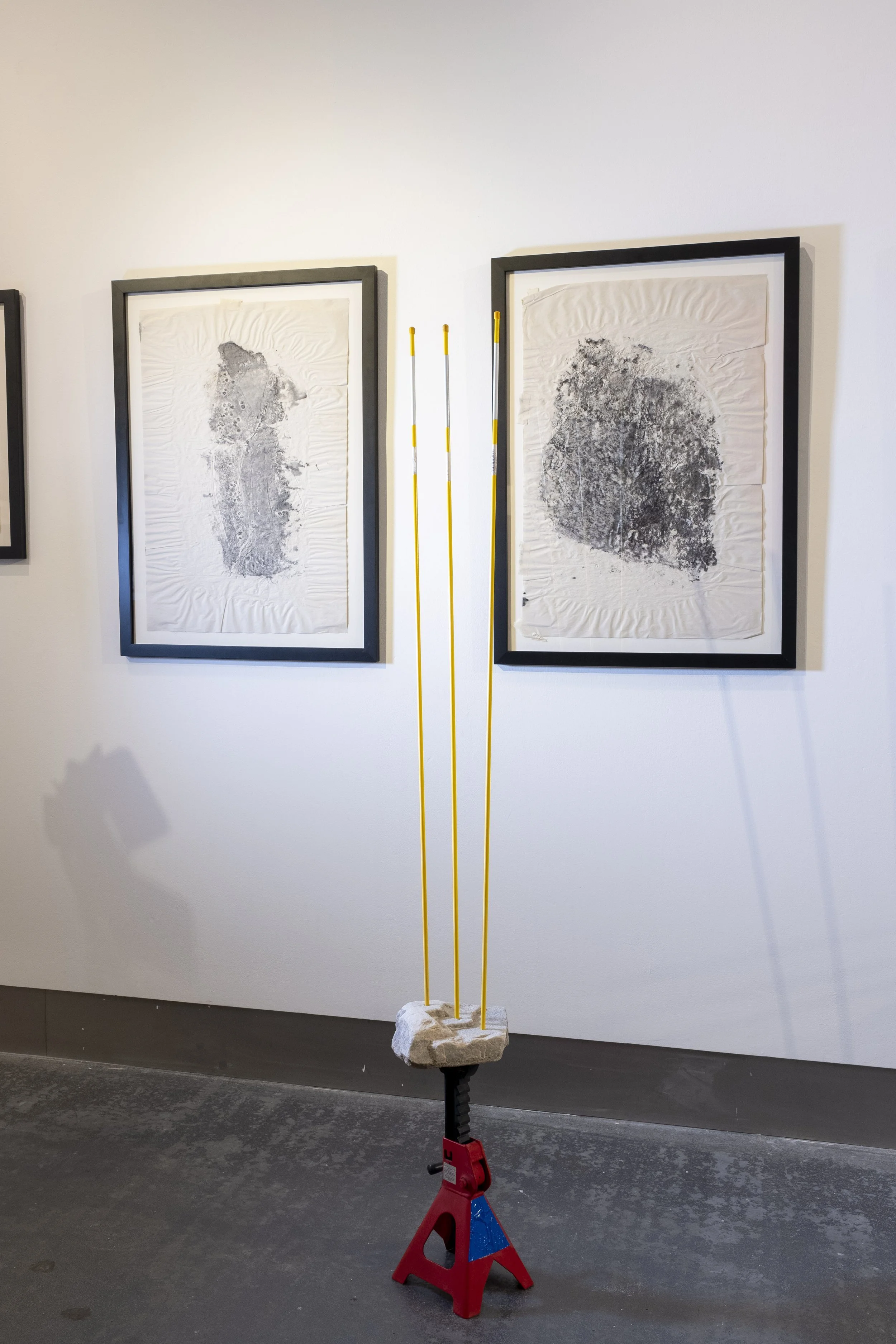 Shore Stones, 2021, installation view, ink on newsprint and stone. A Remix of Damage, Strata Collective, Reid Gallery, The Glasgow School of Art, 2022. © McAteer Photograph