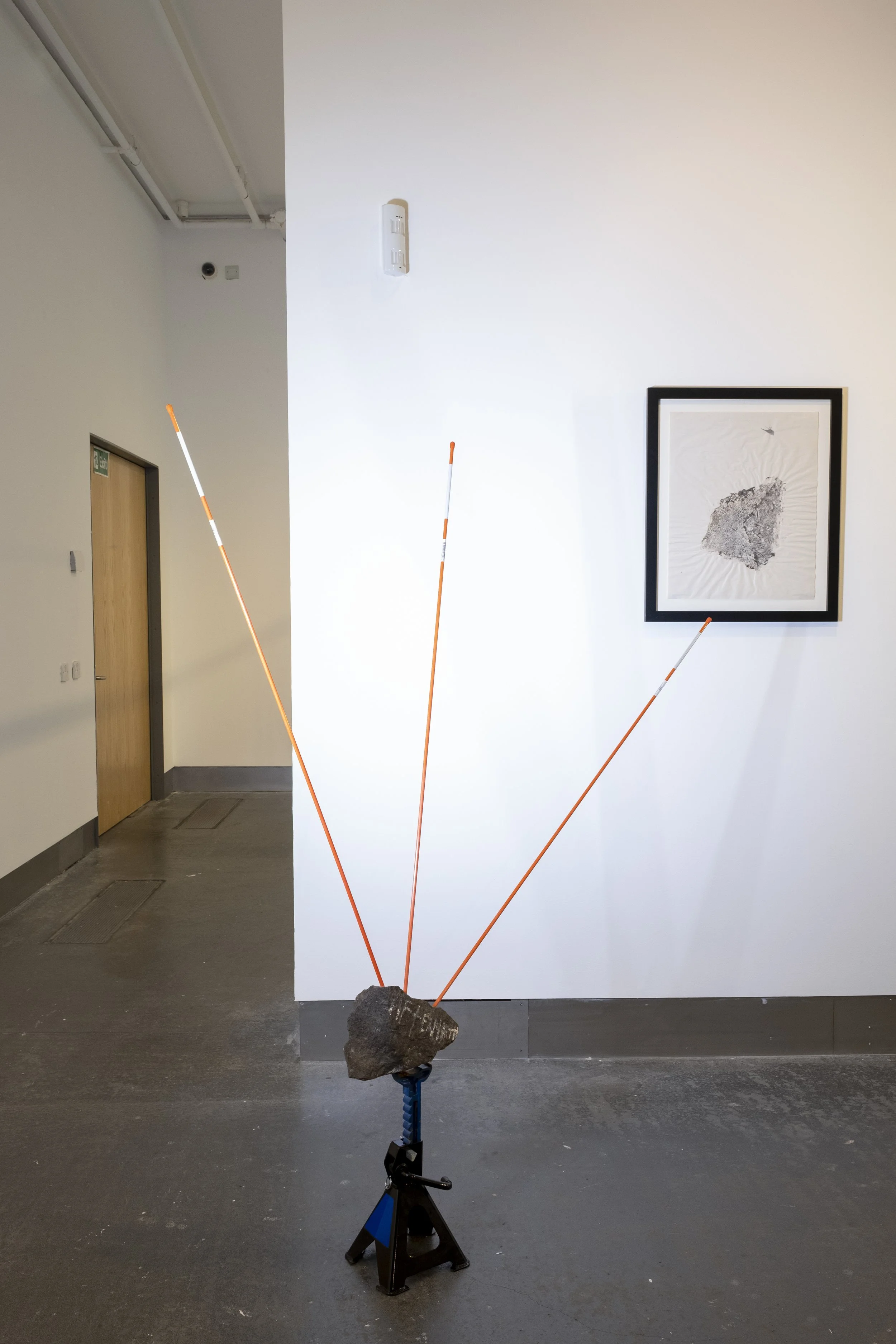 Shore Stones, 2021, installation view, ink on newsprint and stone. A Remix of Damage, Strata Collective, Reid Gallery, The Glasgow School of Art, 2022. © McAteer Photograph