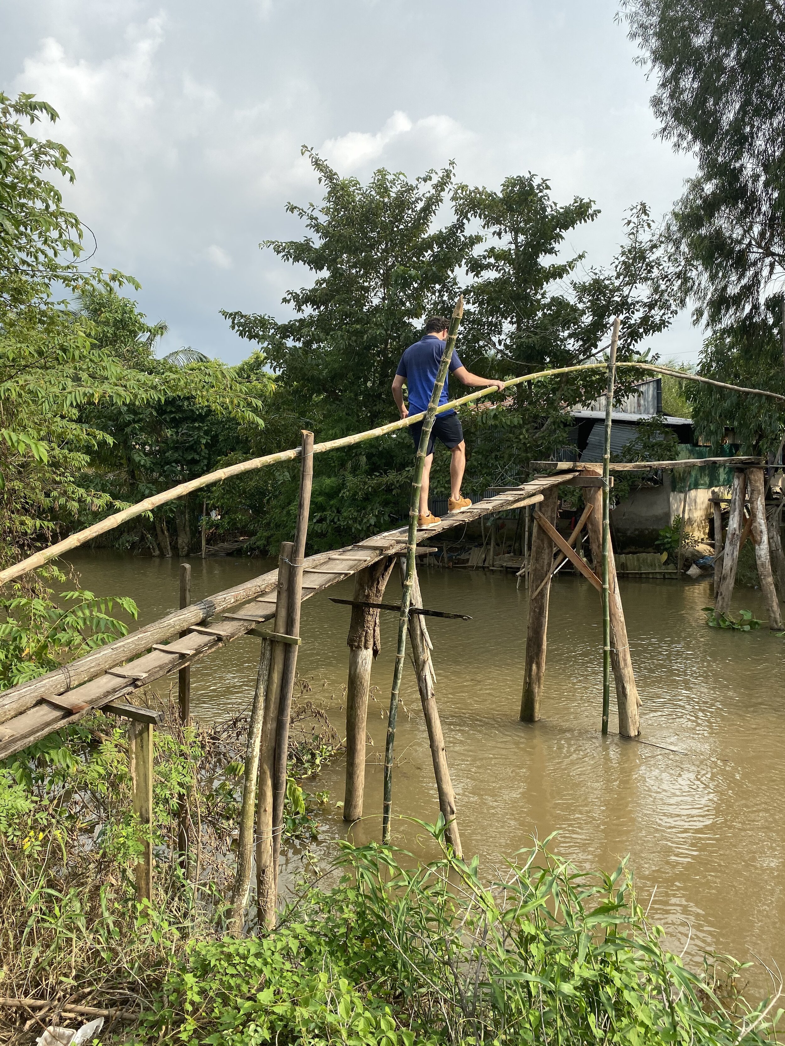 aqua expeditions mekong bridge.JPG