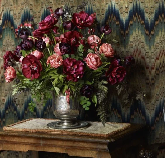 An early surviving example of flame stitch is found on the walls of Britain’s Parham House. They date from from the 16th century.