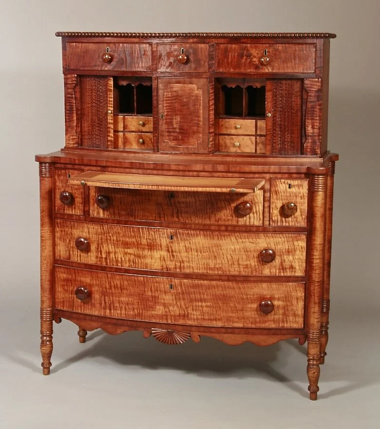 Sheraton secretary with sliding tambour doors and pull-out desk.