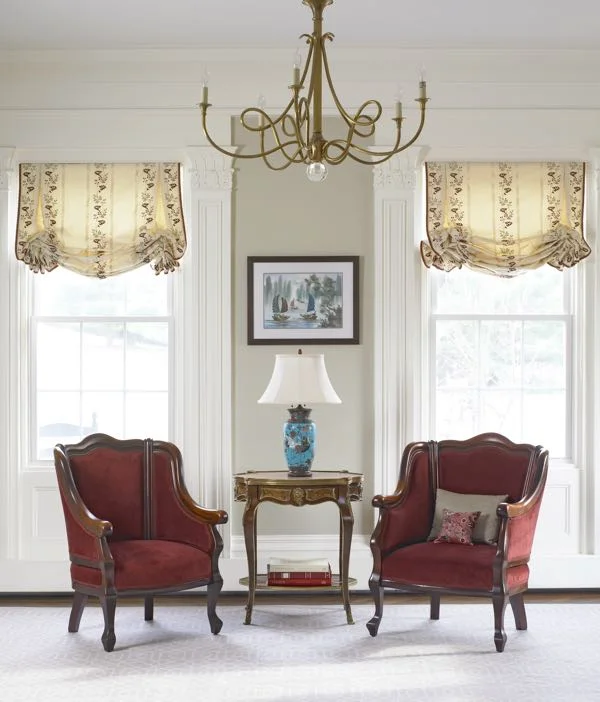1. What is the proper name for the two chairs in this room I designed?