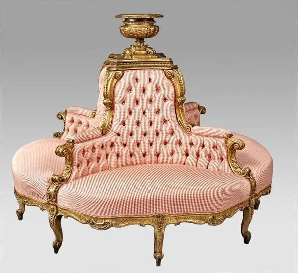 A Louis XV style circular gilt wood borne settee