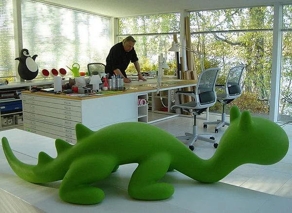 Eero Aarnio in his office. Can’t miss the darling dragon, but look for the penguin and mini ball chairs
