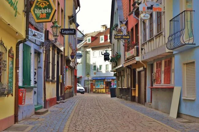 A colorful, cobblestone street in Frankfurt, Germany