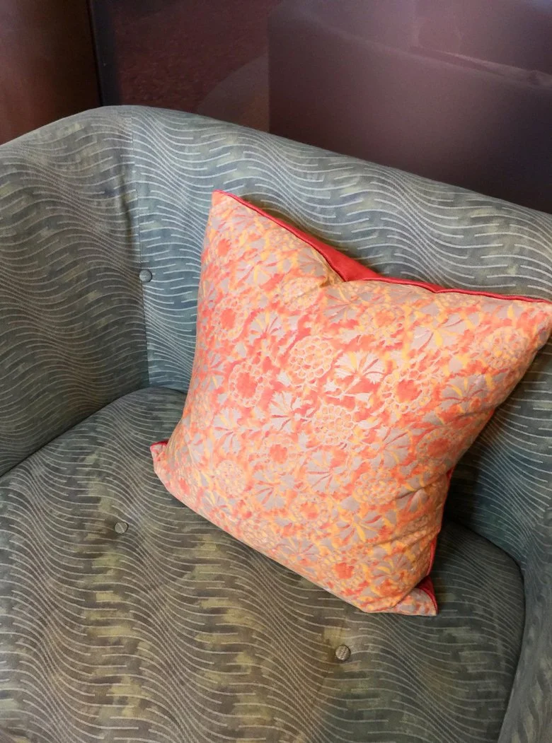 Chair and pillow in Fortuny fabric from the Fortuny Showroom in Venice