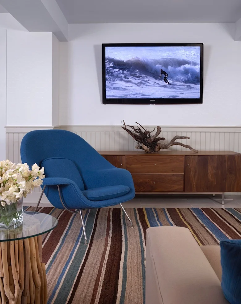 A game room in Montauk NY (part of the Hamptons) created from a basement renovation designed by Lynn Byrne of Decor Arts Now.