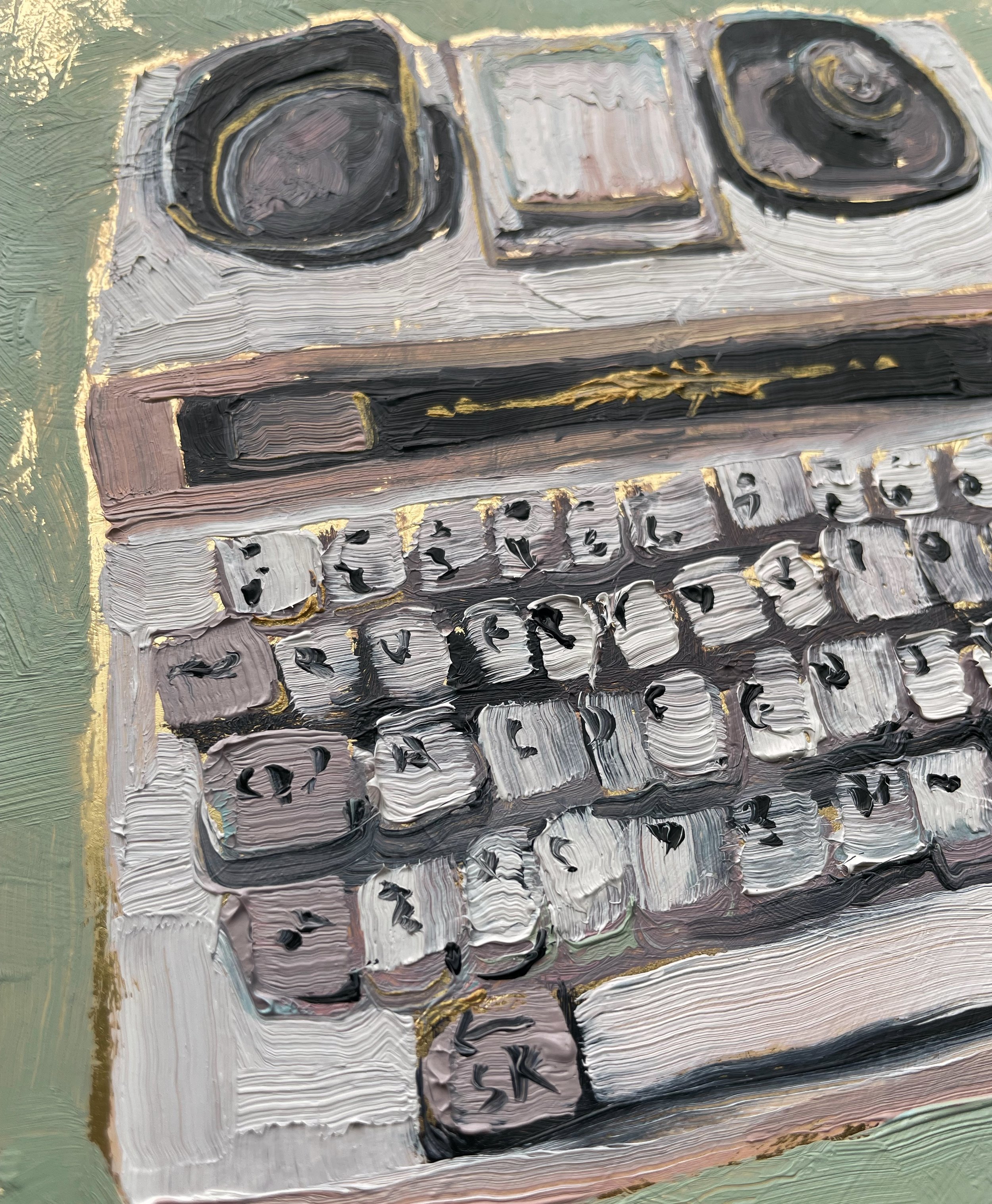 a low angle on the tty painting that shows the gold leaf under the paint