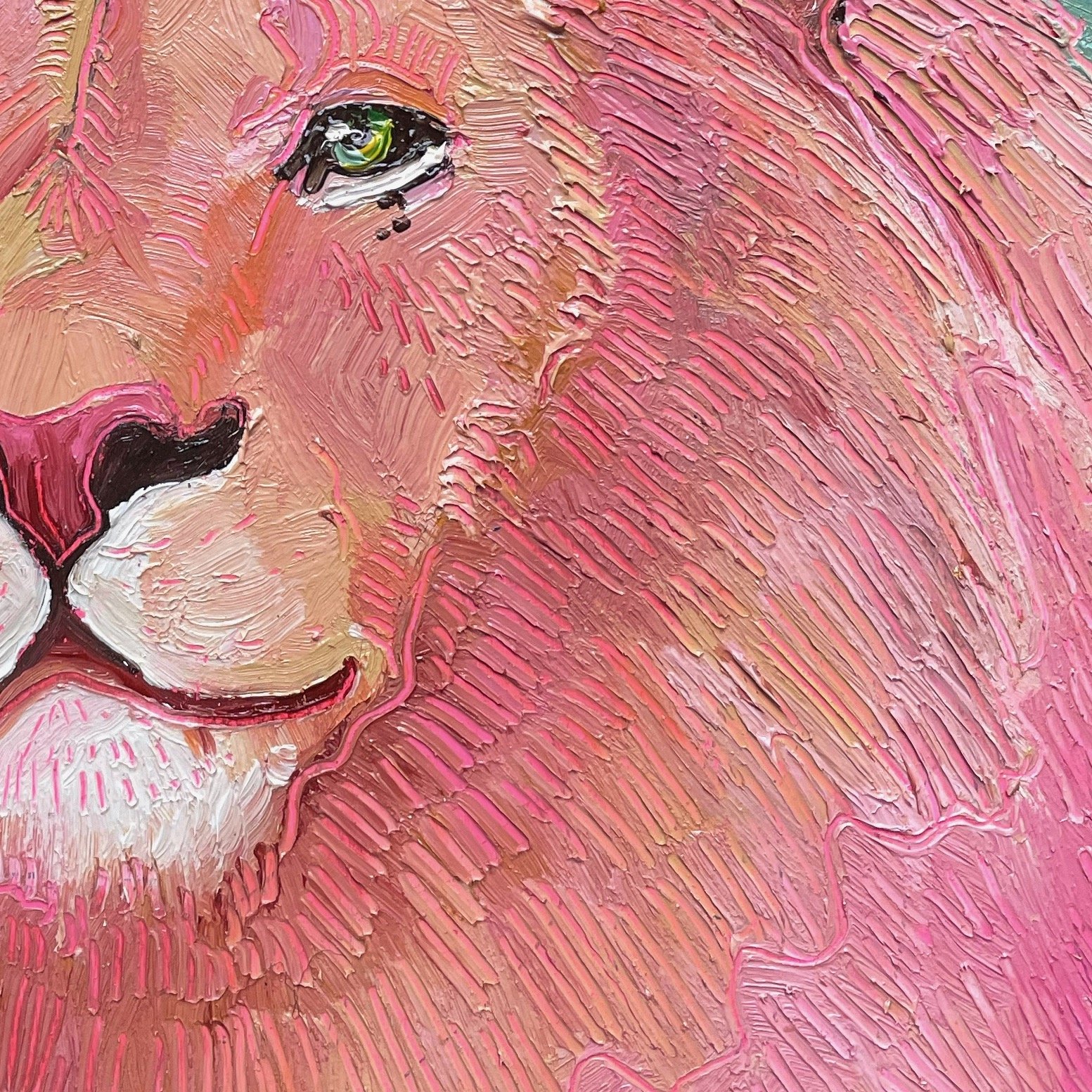 a close up on a colorful painting of a lion against a green background