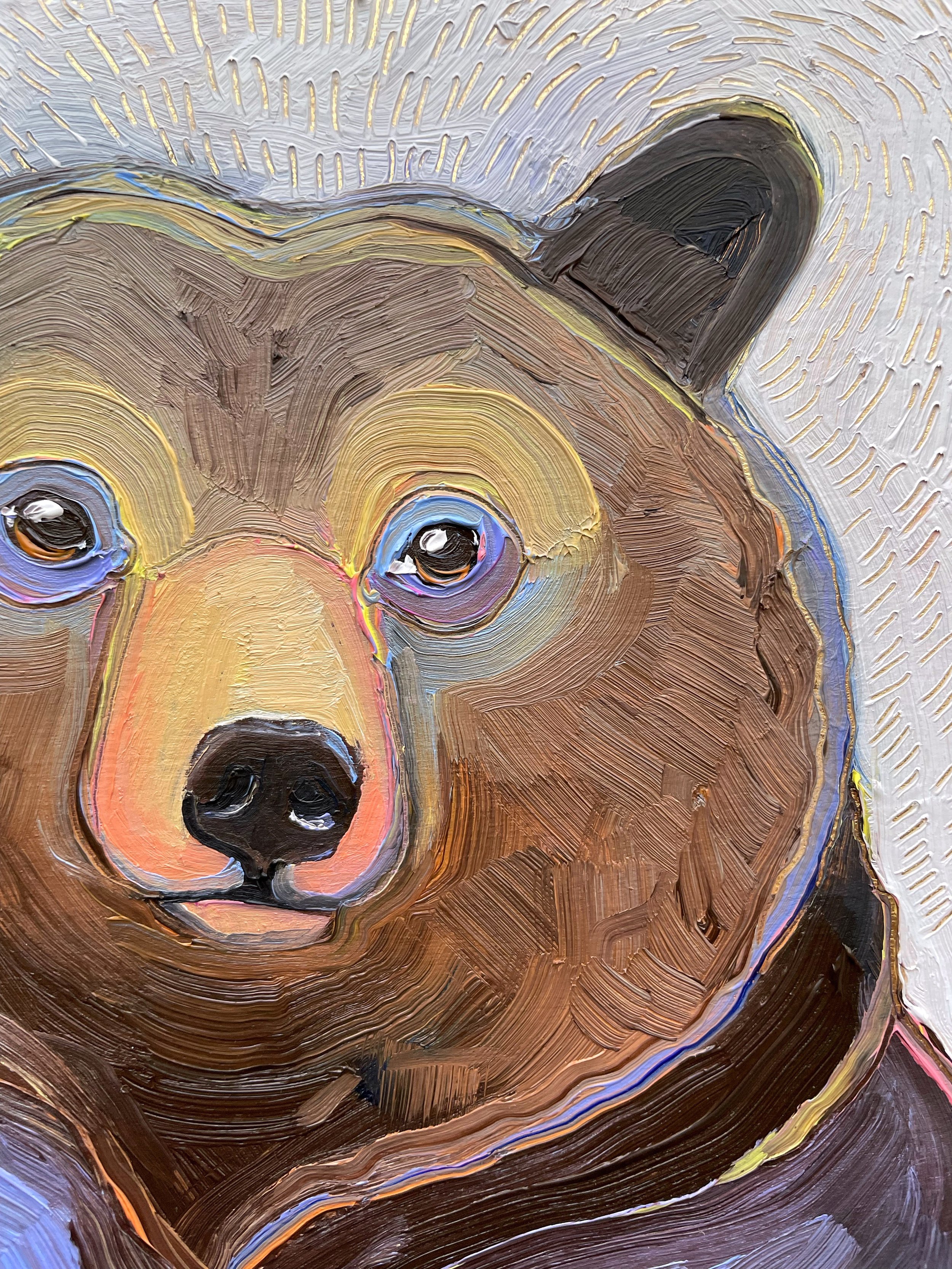 a close up on the soft painting of a brown bear against a white background