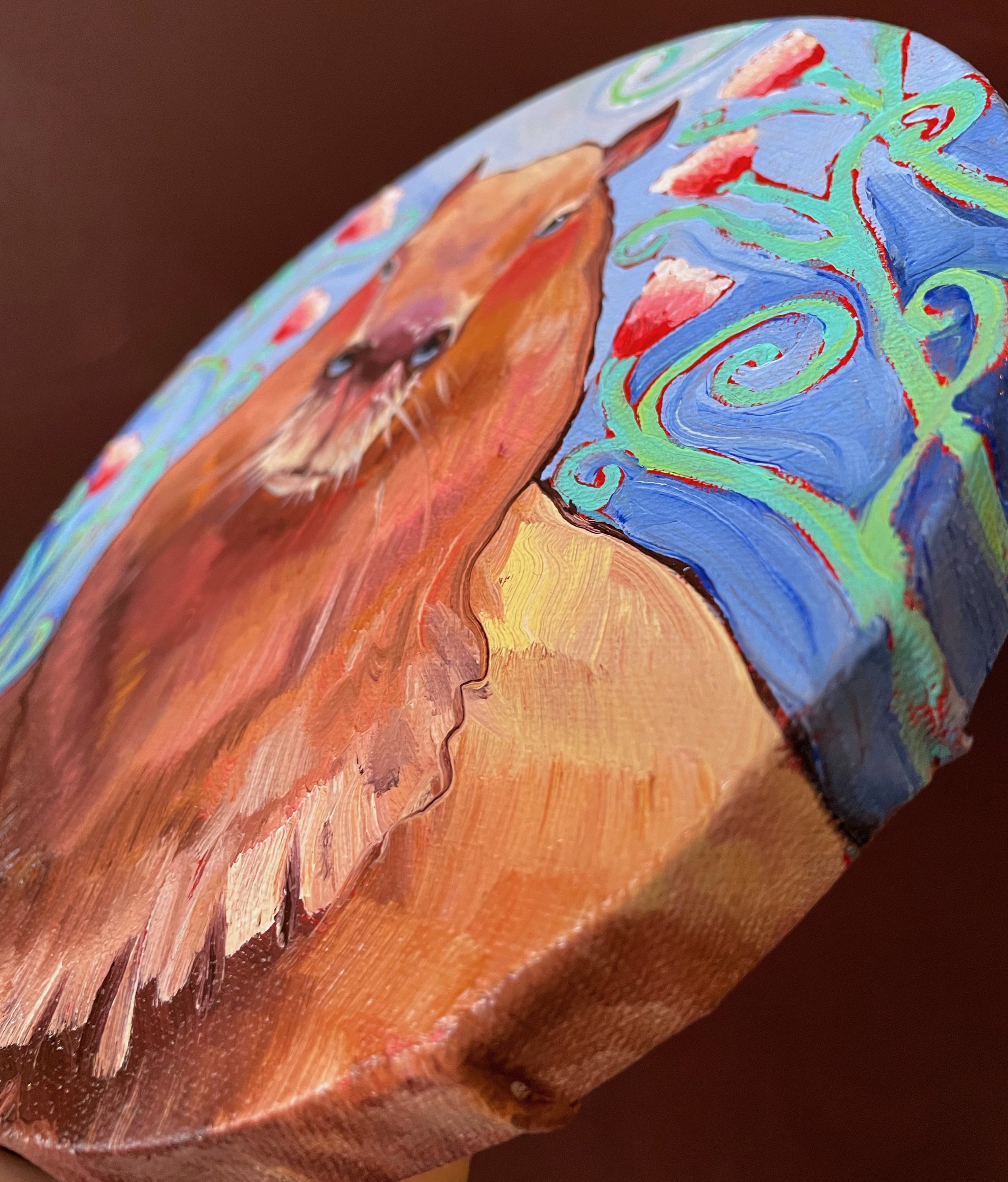a side view of the capybara painting