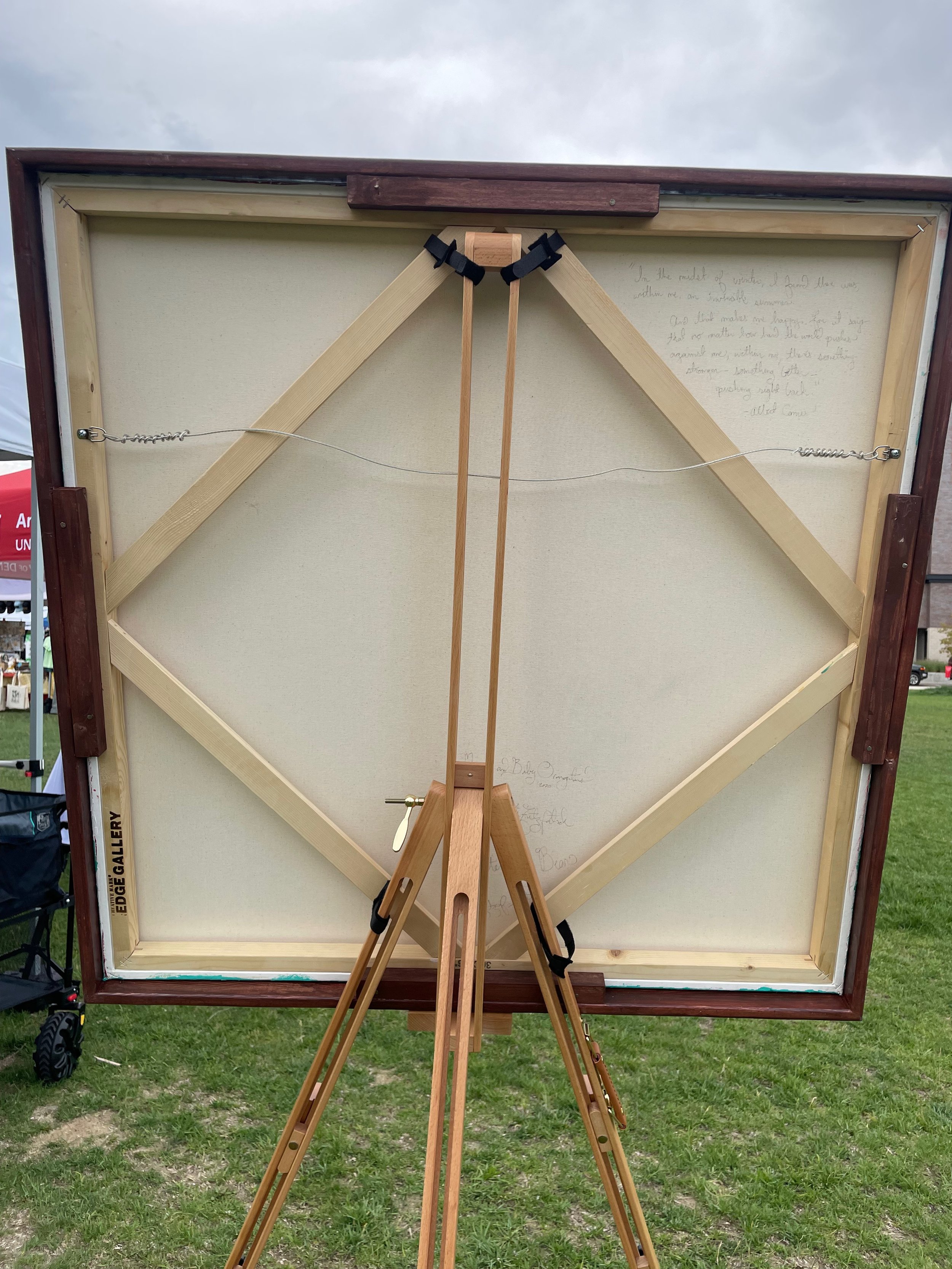 the back of the bear painting showing the canvas back