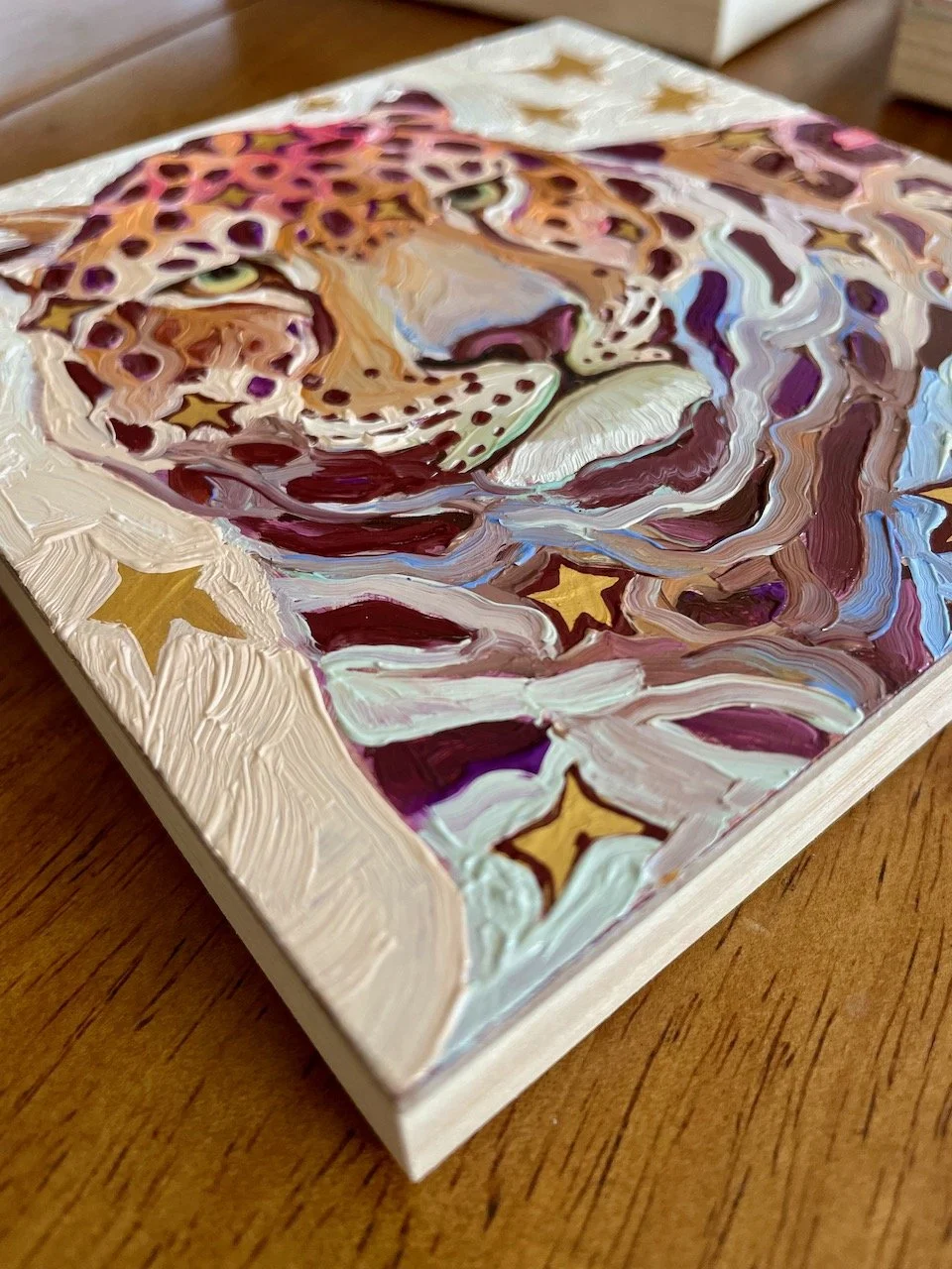 a low side angle of the leopard painting