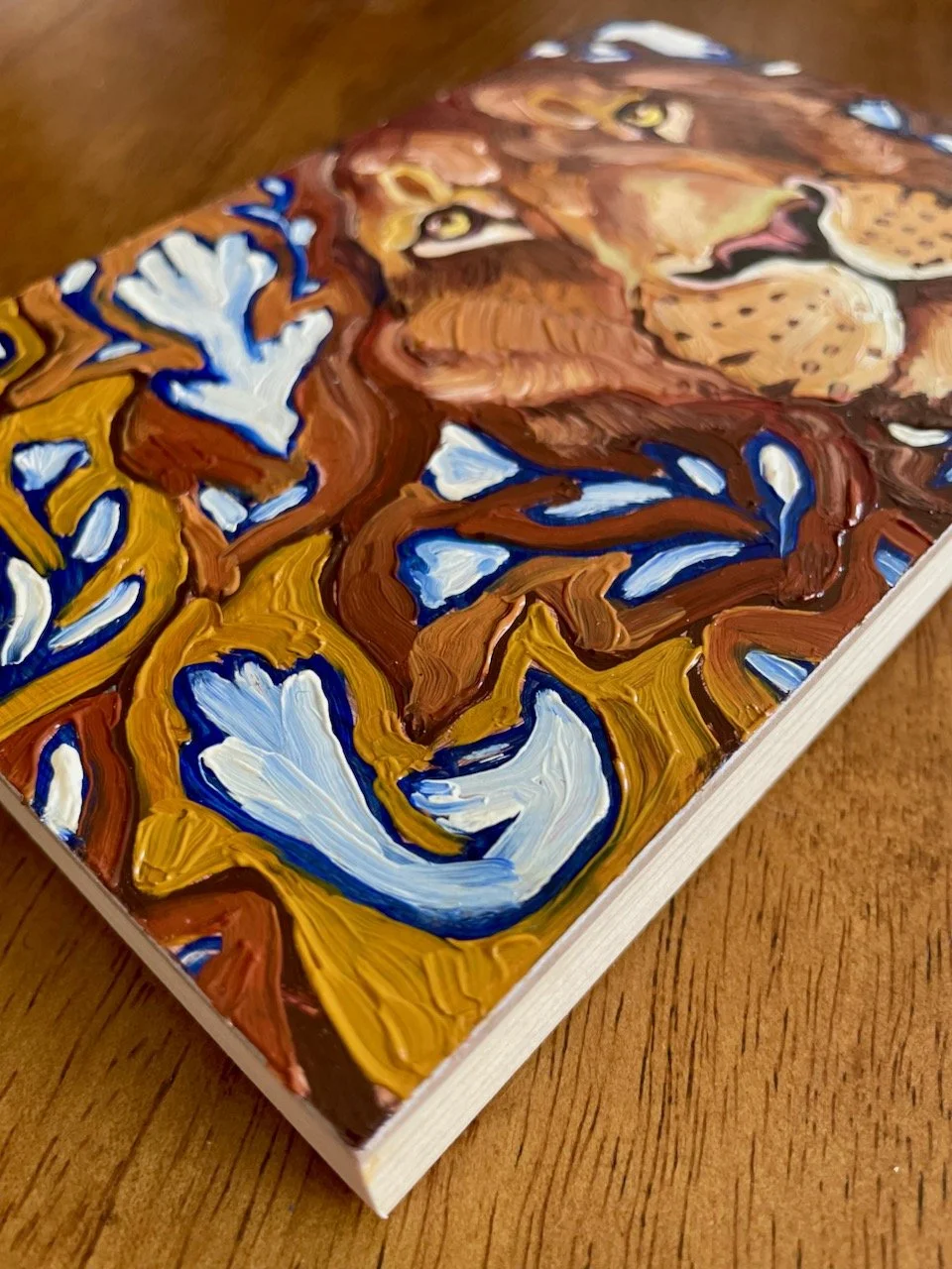 a low side angle on the lion painting