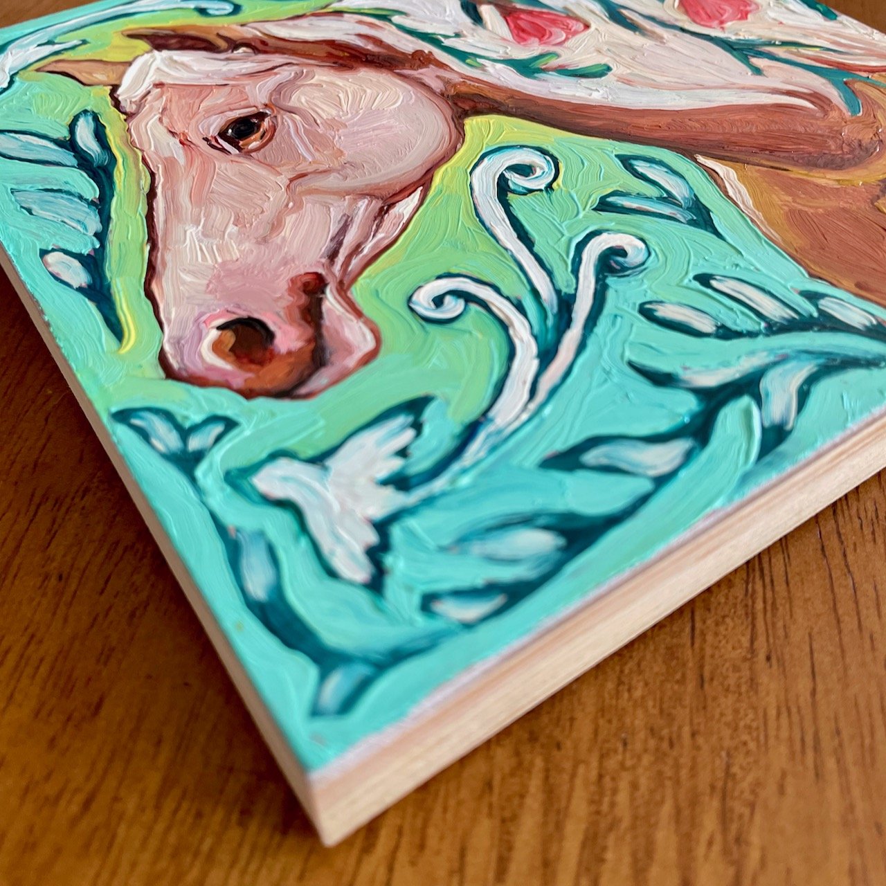 a low side angle on the horse painting