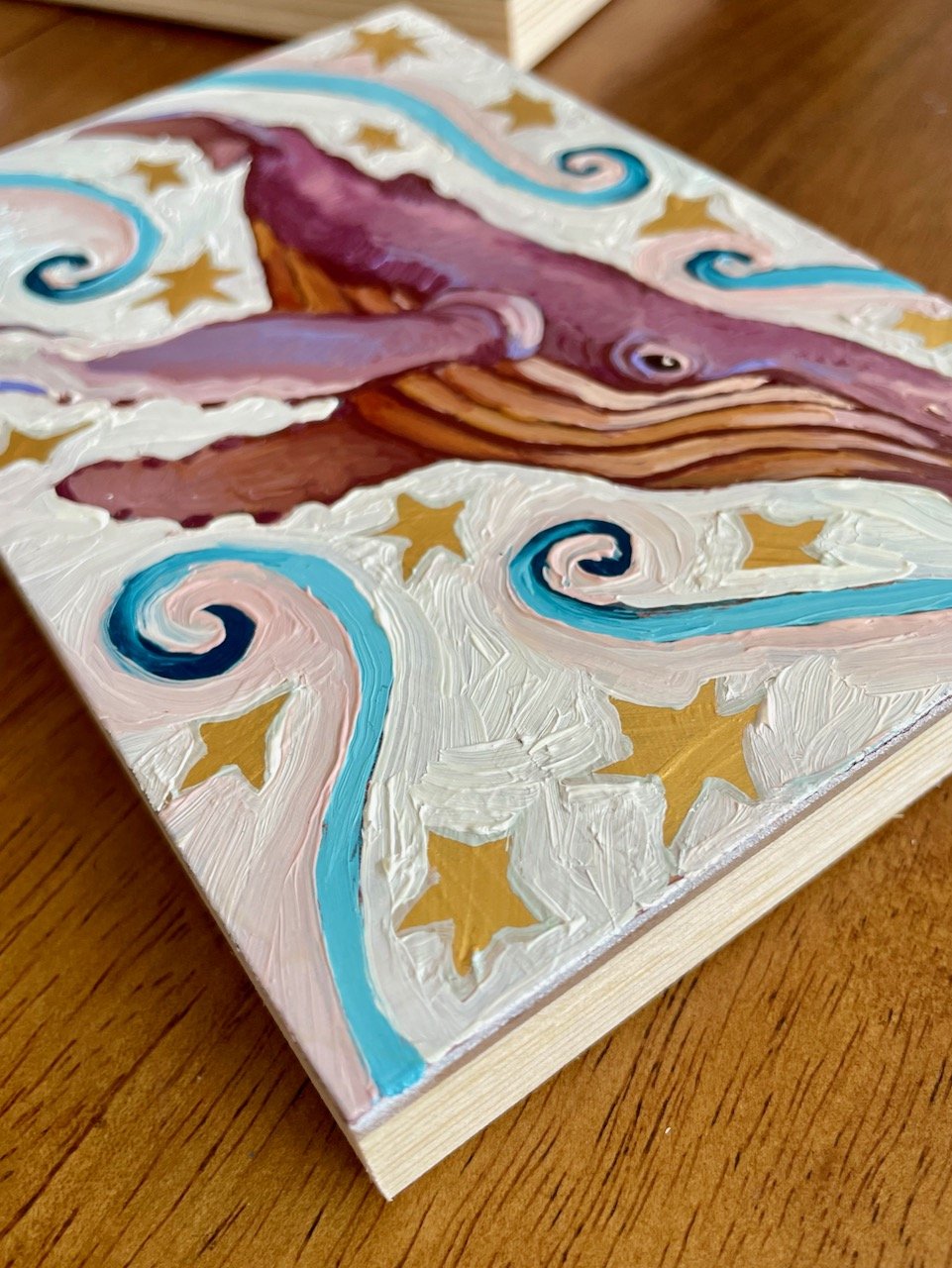 a low side angle on the whale painting